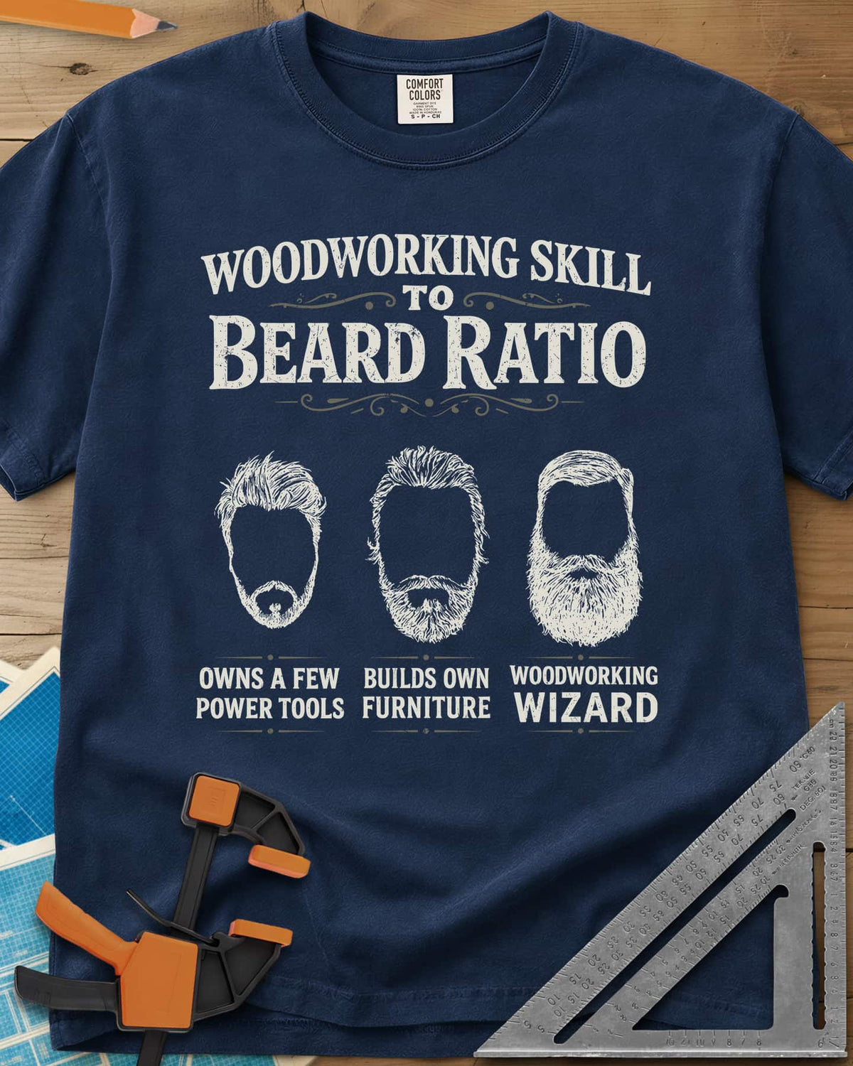 Skill To Beard Ratio heavyweight tee in Navy, three bearded faces growing from a few power tools to wizard
