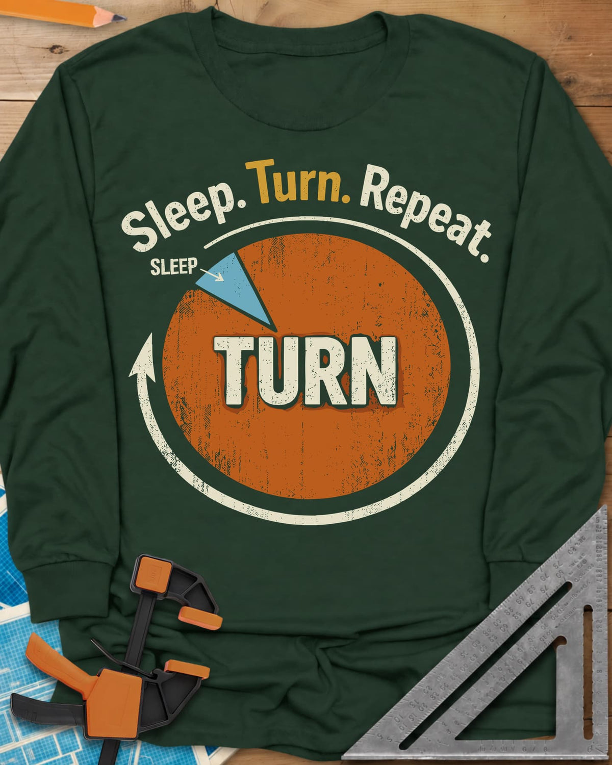 Sleep Turn Repeat long sleeve shirt in Forest Green, a pie chart that is almost all TURN with a sliver of SLEEP
