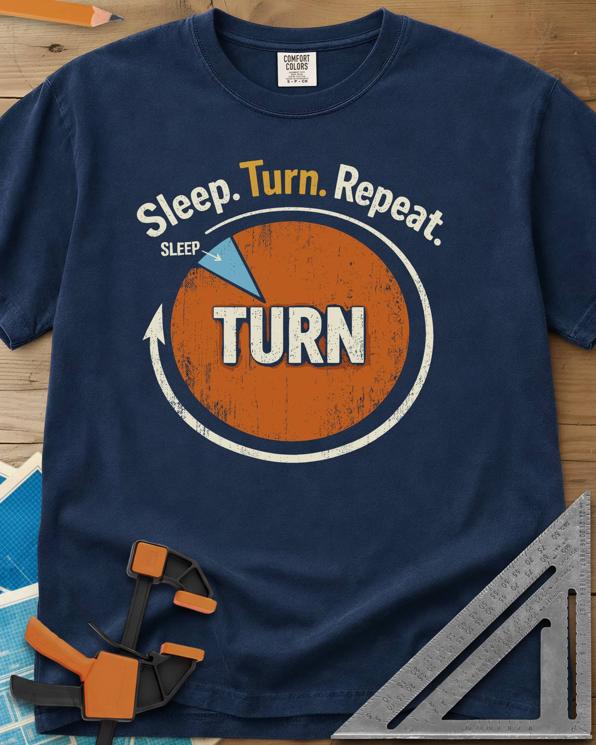Sleep Turn Repeat heavyweight tee in Navy, a pie chart that is almost all TURN with a sliver of SLEEP