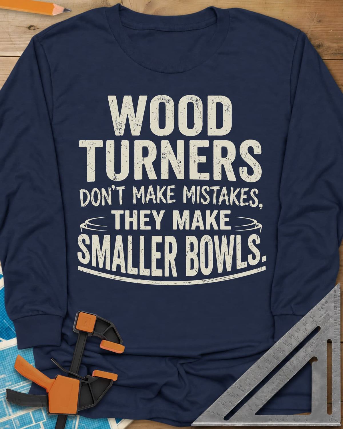 Smaller Bowls long sleeve shirt in Navy, a simple bowl outline curving around the last lines of text