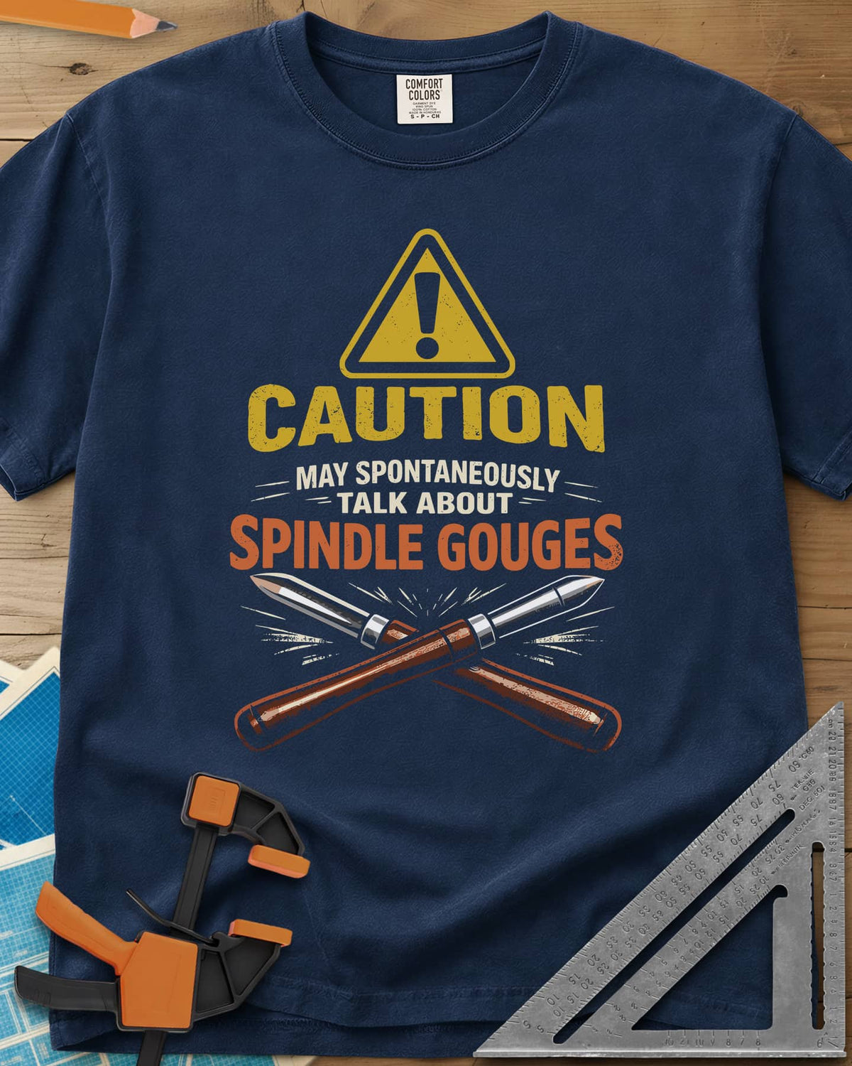 Spindle Gouges heavyweight tee in Navy, a hazard triangle above two crossed spindle gouges