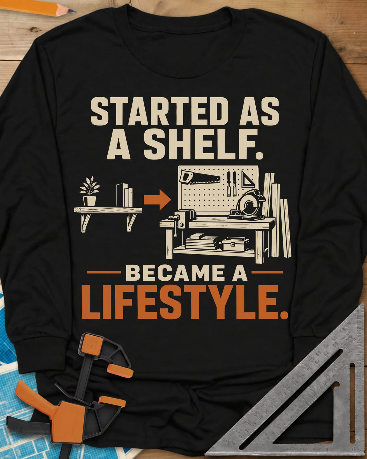 Started As A Shelf long sleeve shirt in Black, a plant shelf, an arrow, then a workbench with pegboard and vise