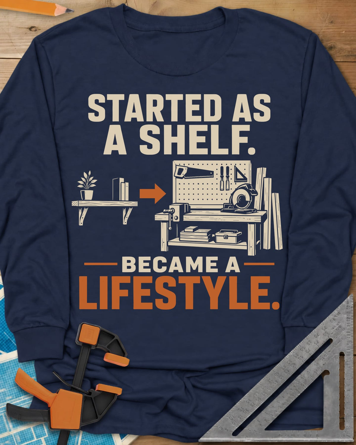 Started As A Shelf long sleeve shirt in Navy, a plant shelf, an arrow, then a workbench with pegboard and vise