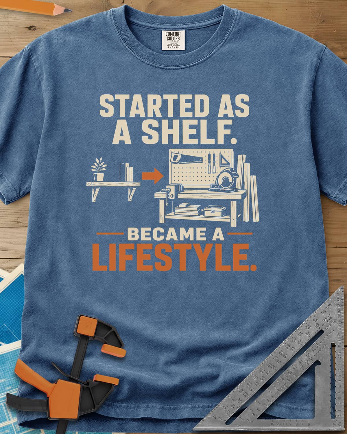Started As A Shelf heavyweight tee in Blue Jean, a plant shelf, an arrow, then a workbench with pegboard and vise