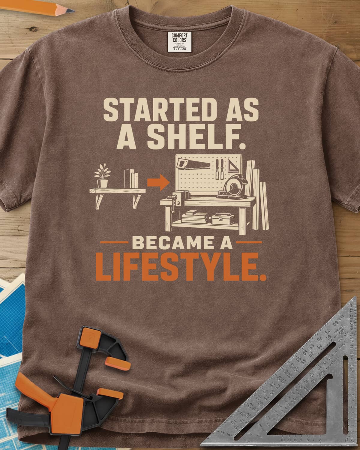 Started As A Shelf heavyweight tee in Espresso, a plant shelf, an arrow, then a workbench with pegboard and vise
