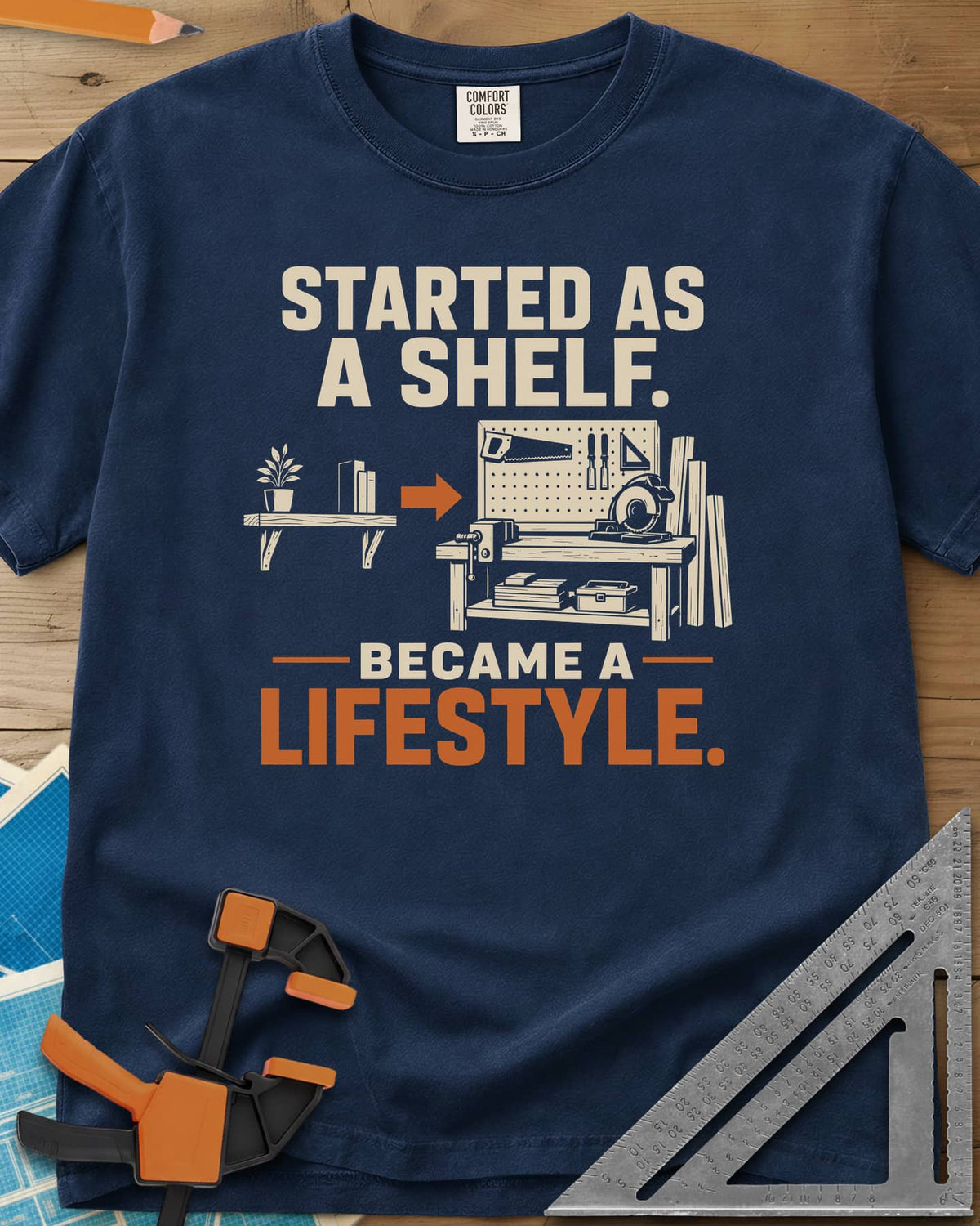 Started As A Shelf heavyweight tee in Navy, a plant shelf, an arrow, then a workbench with pegboard and vise