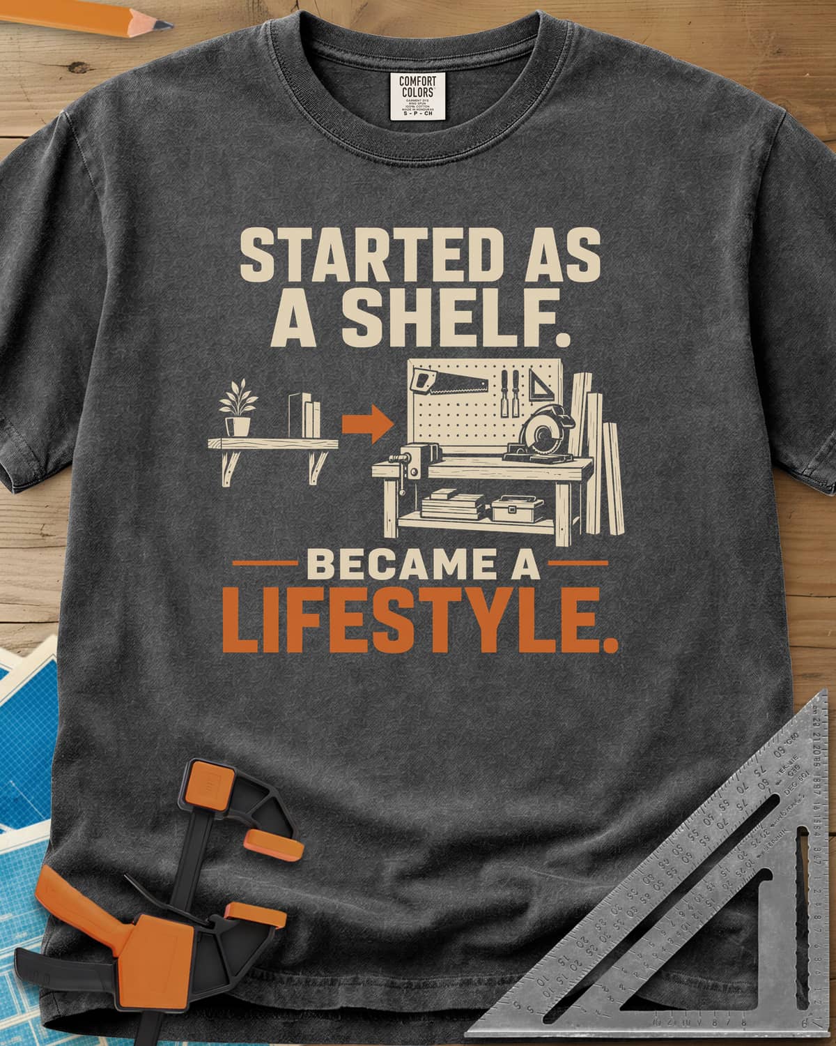 Started As A Shelf heavyweight tee in Pepper, a plant shelf, an arrow, then a workbench with pegboard and vise
