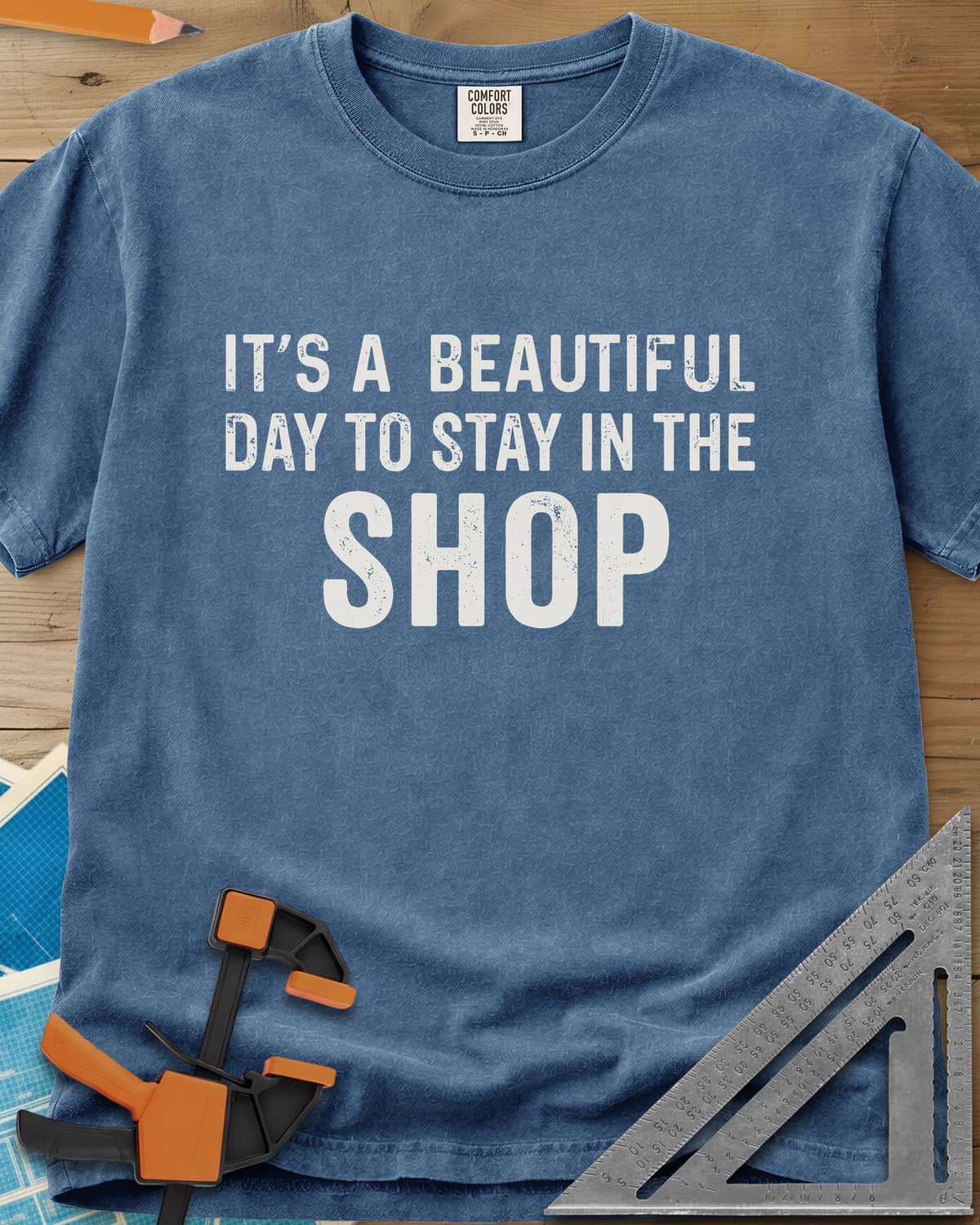 Stay In The Shop heavyweight tee in Blue Jean, distressed lettering with the word SHOP set extra large