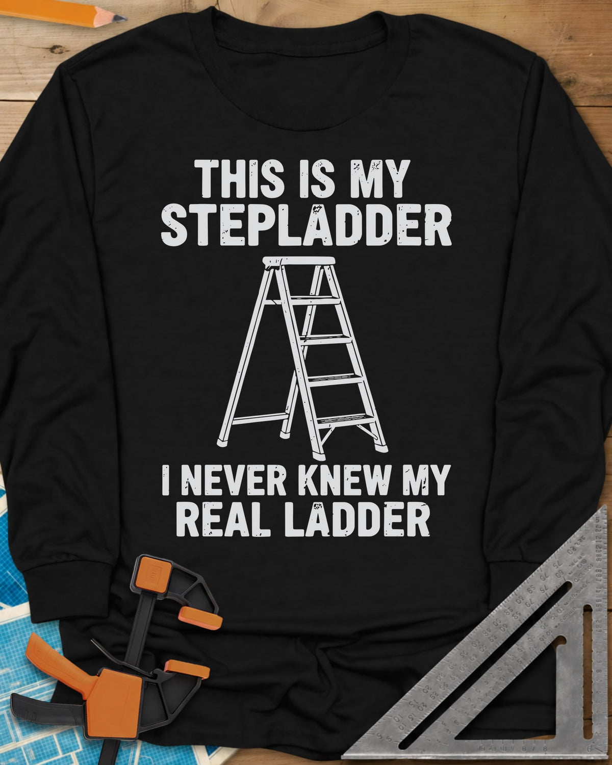 Stepladder long sleeve shirt in Black, a line-drawn stepladder between two lines of worn lettering