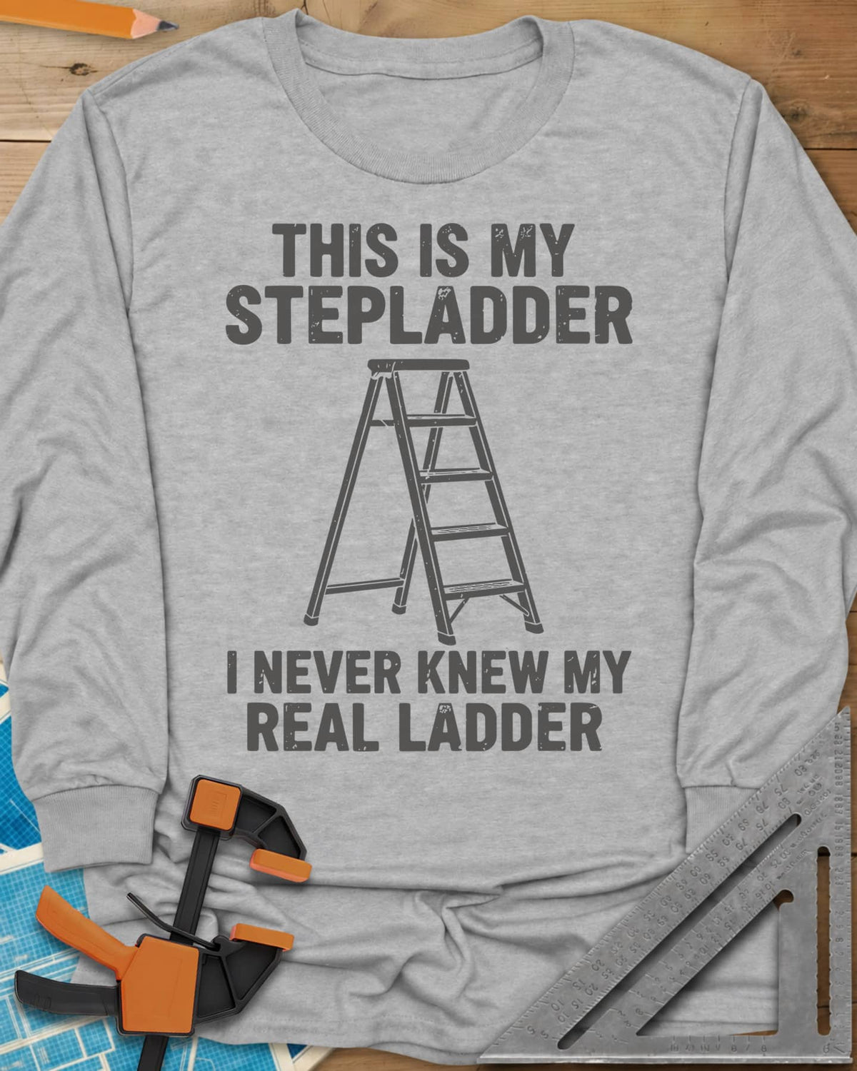 Stepladder long sleeve shirt in Sport Grey, a line-drawn stepladder between two lines of worn lettering