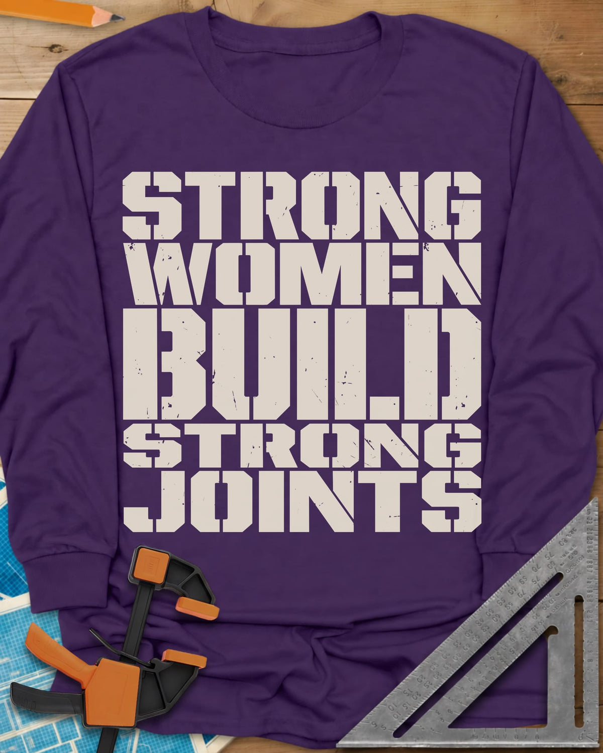 Strong Women long sleeve shirt in Purple, five lines of stacked, worn stencil capitals