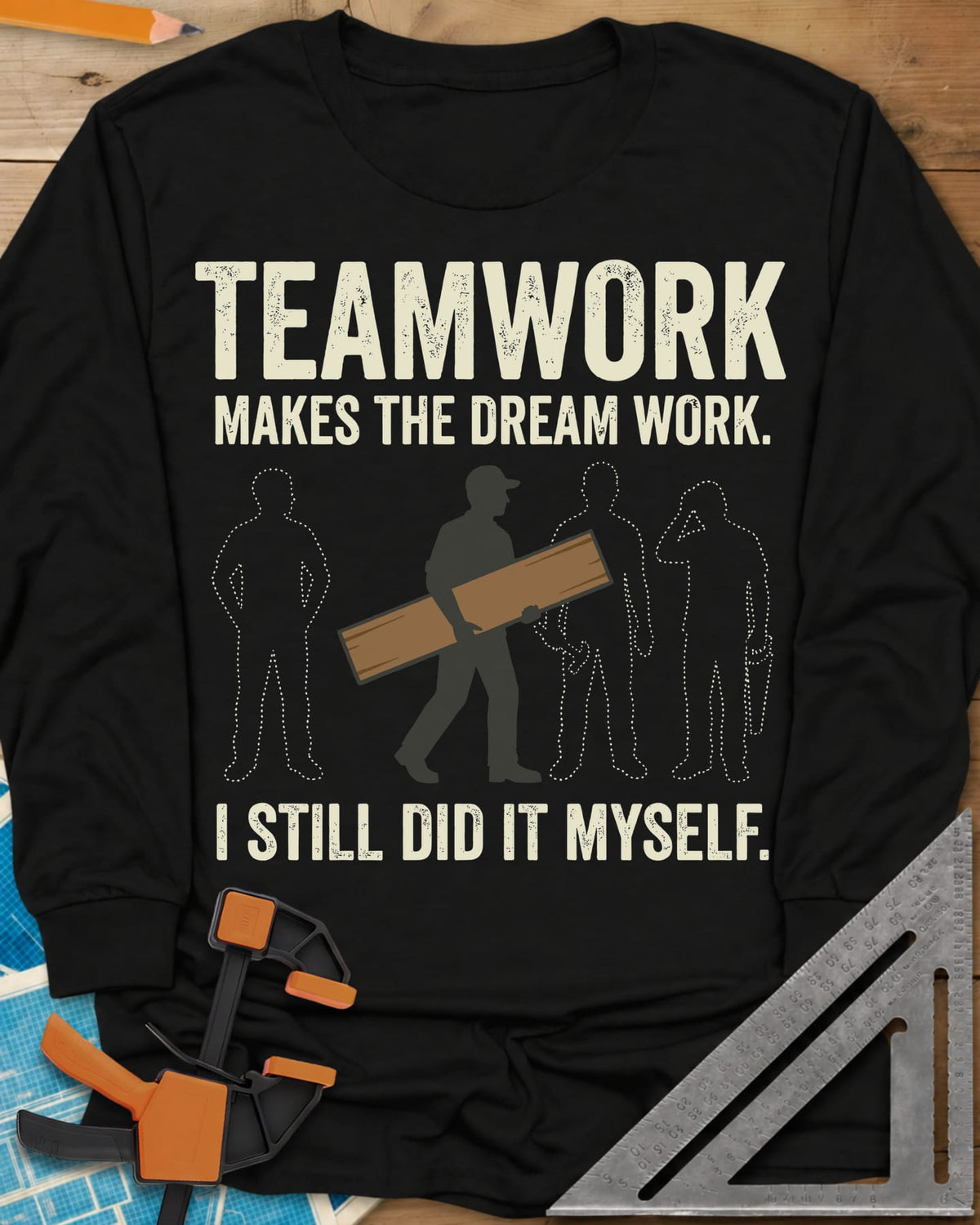 Teamwork I Did It Myself long sleeve shirt in Black, a lone figure carrying a board past three dotted outlines