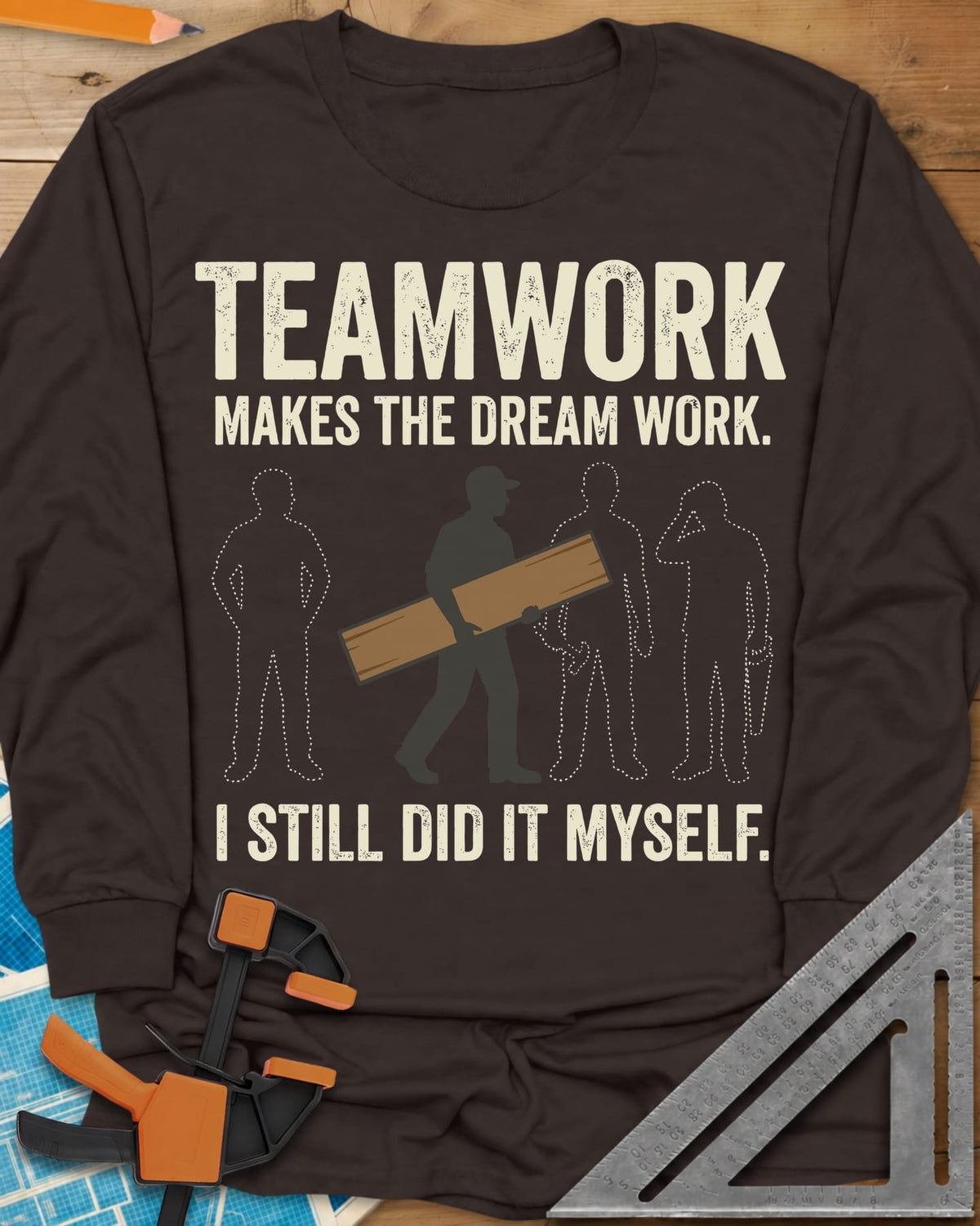 Teamwork I Did It Myself long sleeve shirt in Dark Chocolate, a lone figure carrying a board past three dotted outlines