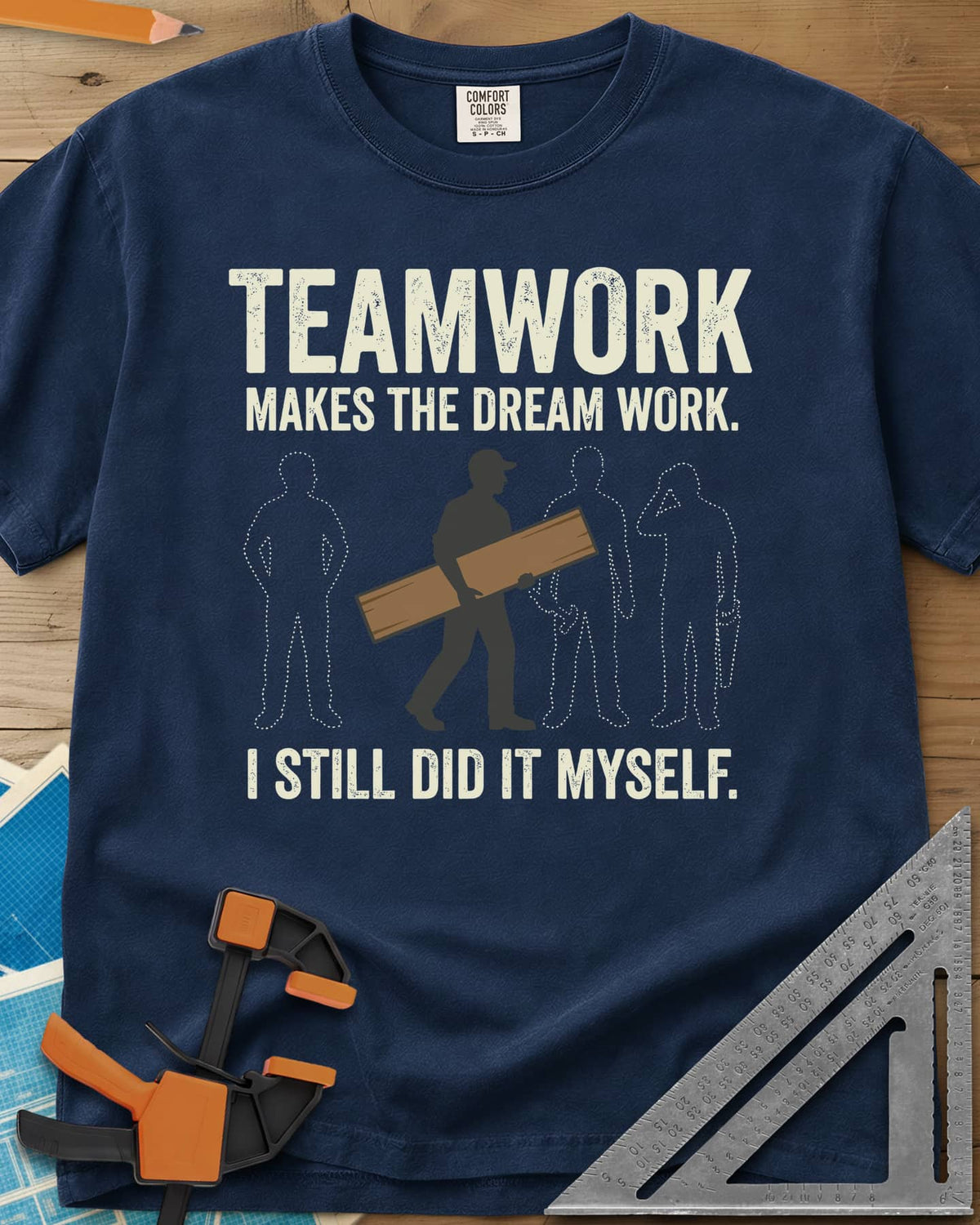 Teamwork I Did It Myself heavyweight tee in Navy, a lone figure carrying a board past three dotted outlines