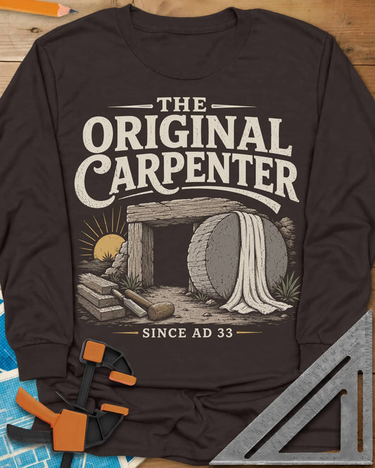 The Original Carpenter long sleeve shirt in Dark Chocolate, an empty tomb at sunrise with planks, a mallet and a chisel