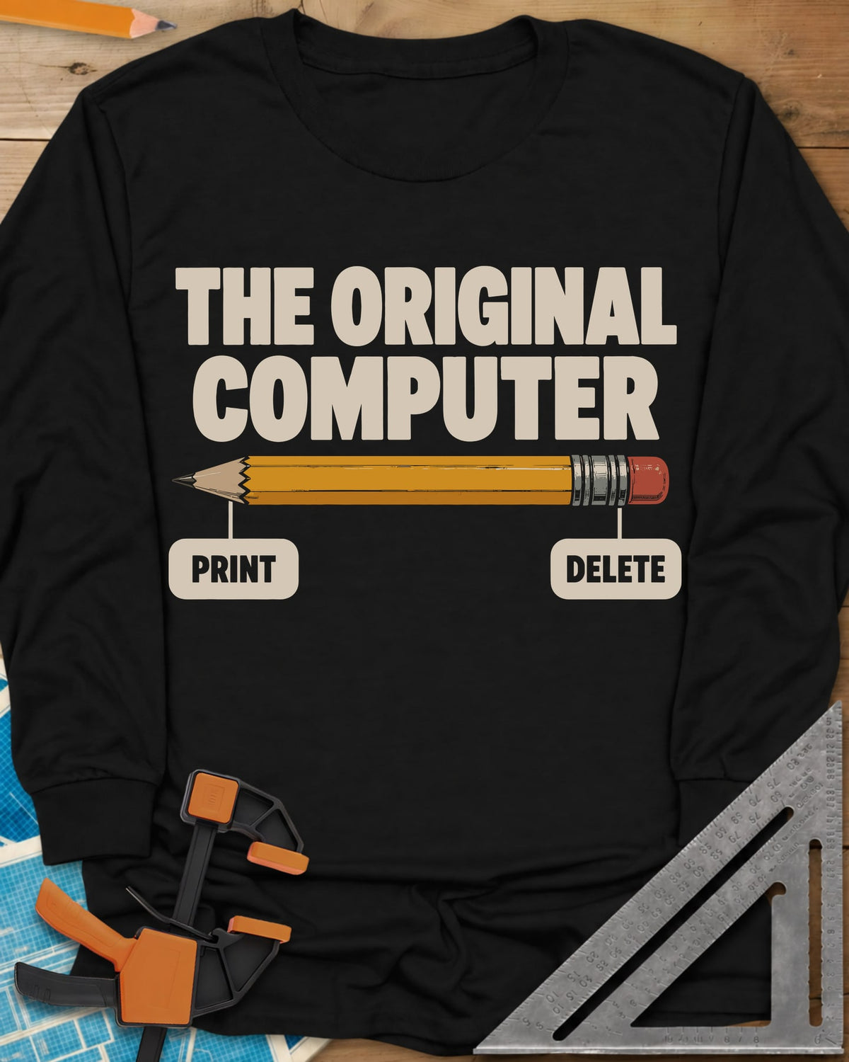 The Original Computer long sleeve shirt in Black, a yellow pencil labeled PRINT at the point and DELETE at the eraser
