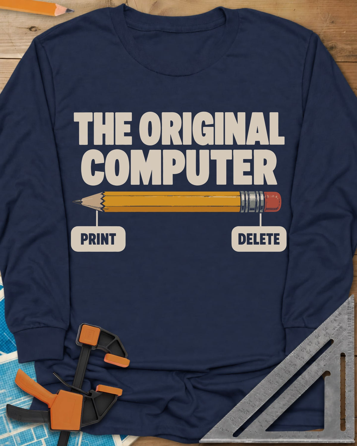 The Original Computer long sleeve shirt in Navy, a yellow pencil labeled PRINT at the point and DELETE at the eraser