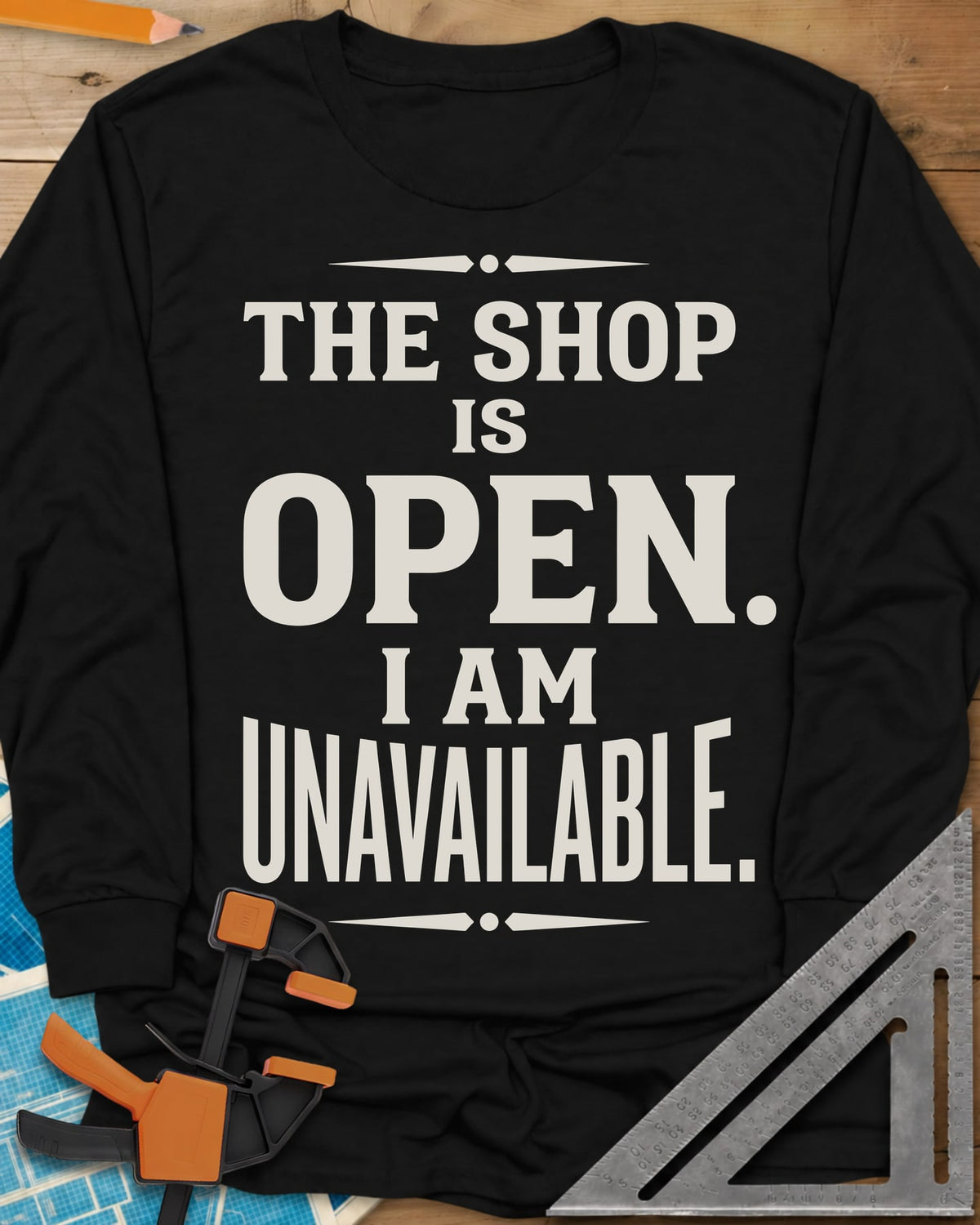 The Shop Is Open I Am Unavailable long sleeve shirt in Black, stacked serif lettering between two ornamental dividers