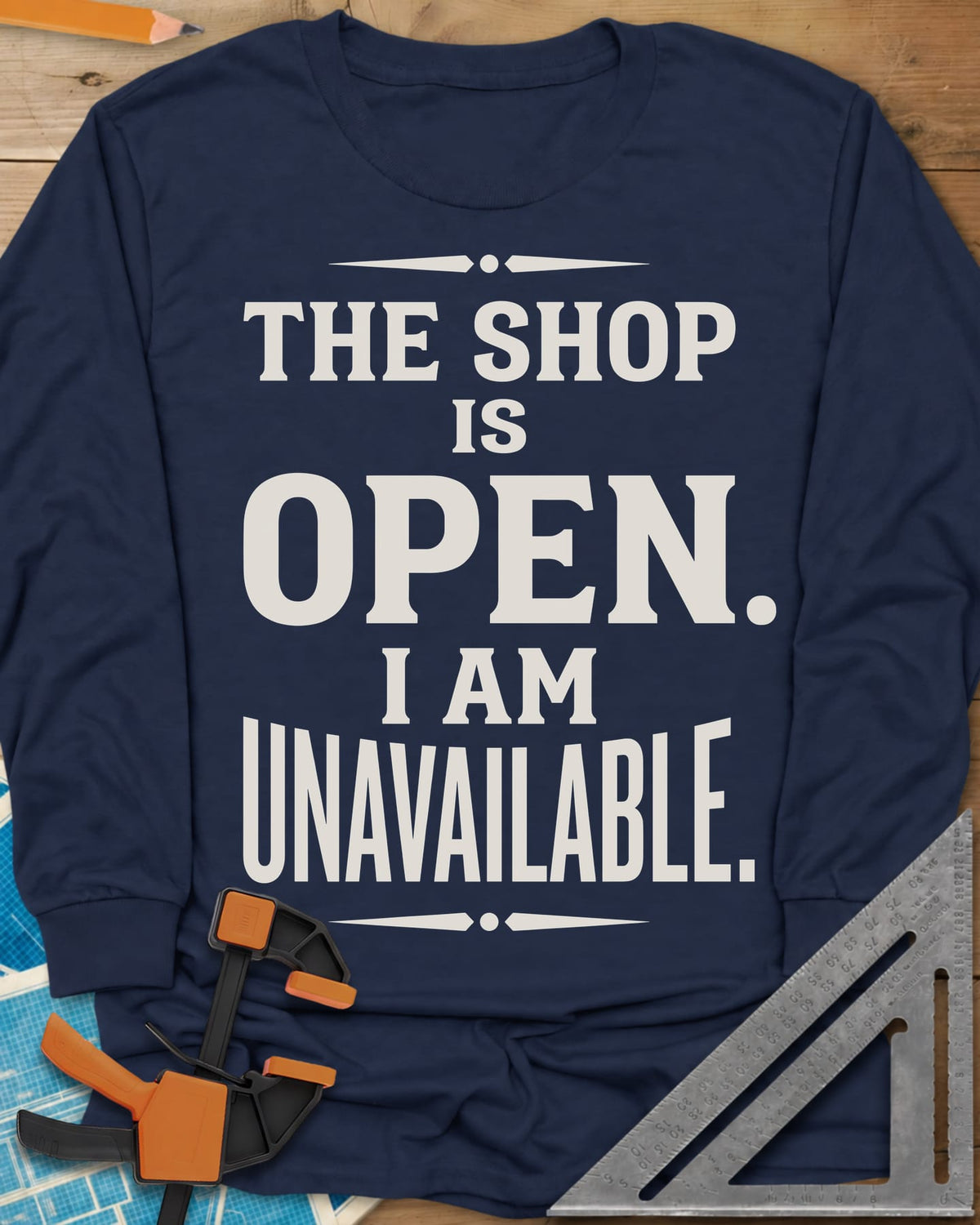 The Shop Is Open I Am Unavailable long sleeve shirt in Navy, stacked serif lettering between two ornamental dividers