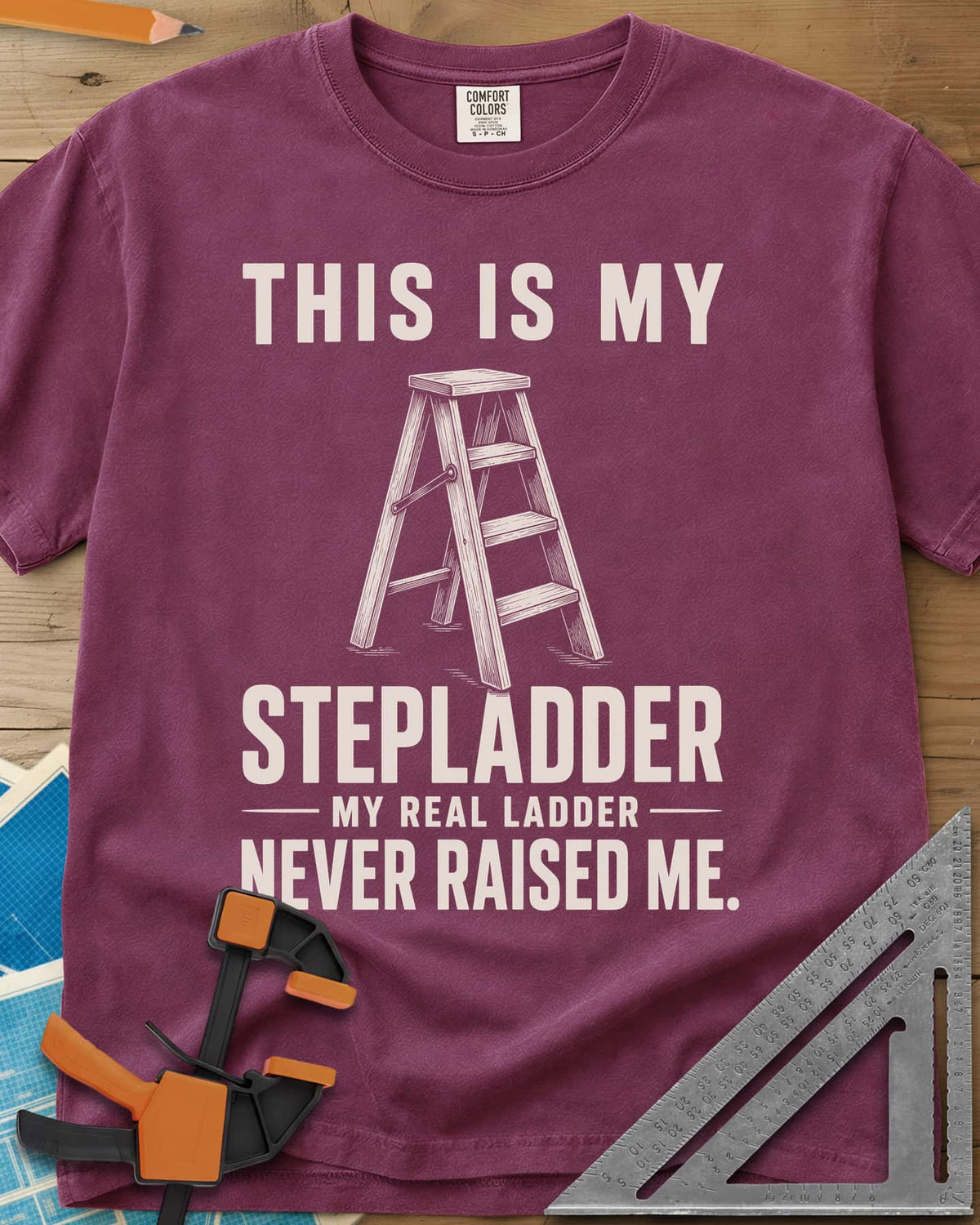 This Is My Stepladder heavyweight tee in Berry, a sketched wooden stepladder between lines of bold text