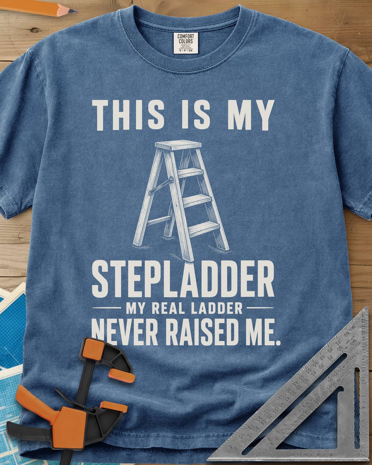 This Is My Stepladder heavyweight tee in Blue Jean, a sketched wooden stepladder between lines of bold text