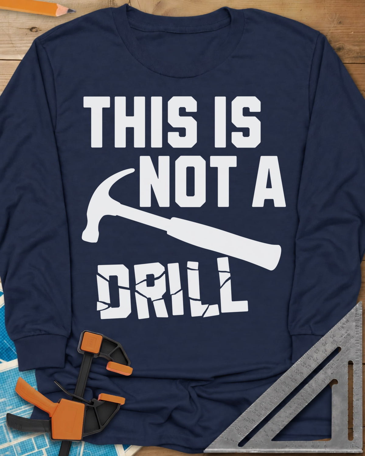This is Not a Drill long sleeve shirt in Navy, a claw hammer across the lettering, with DRILL cracked apart