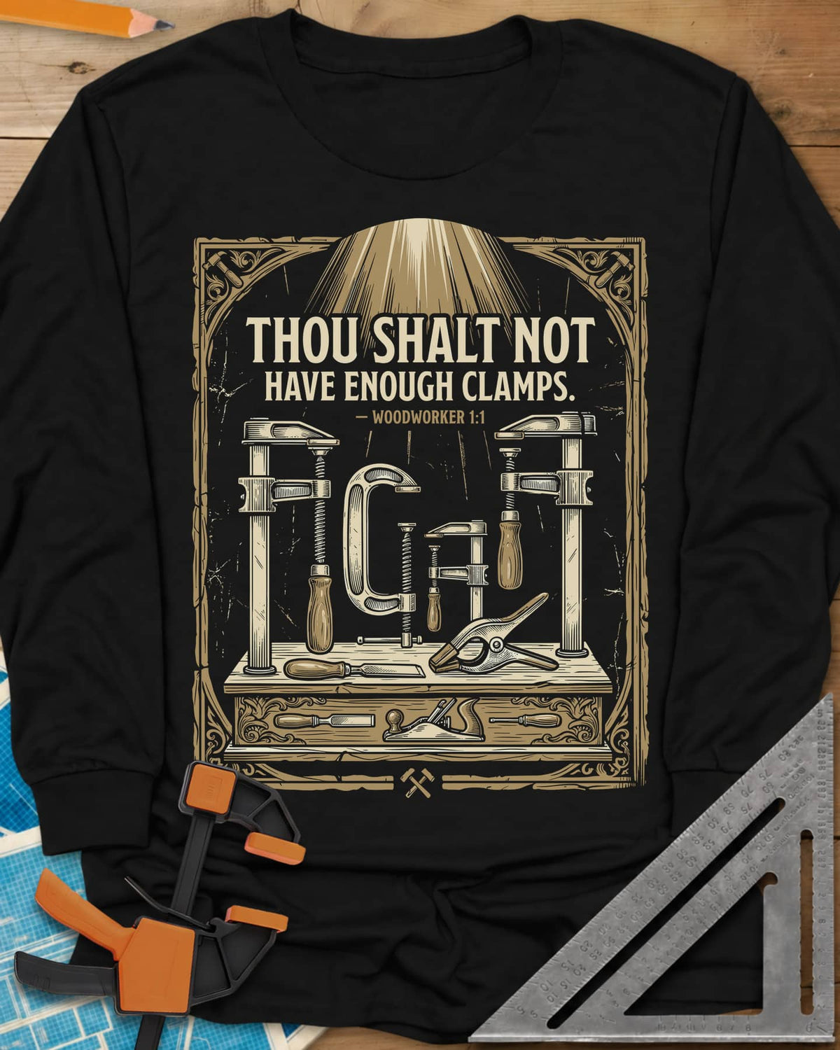 Thou Shalt Have Clamps long sleeve shirt in Black, framed verse over a bench of clamps, a chisel and a hand plane