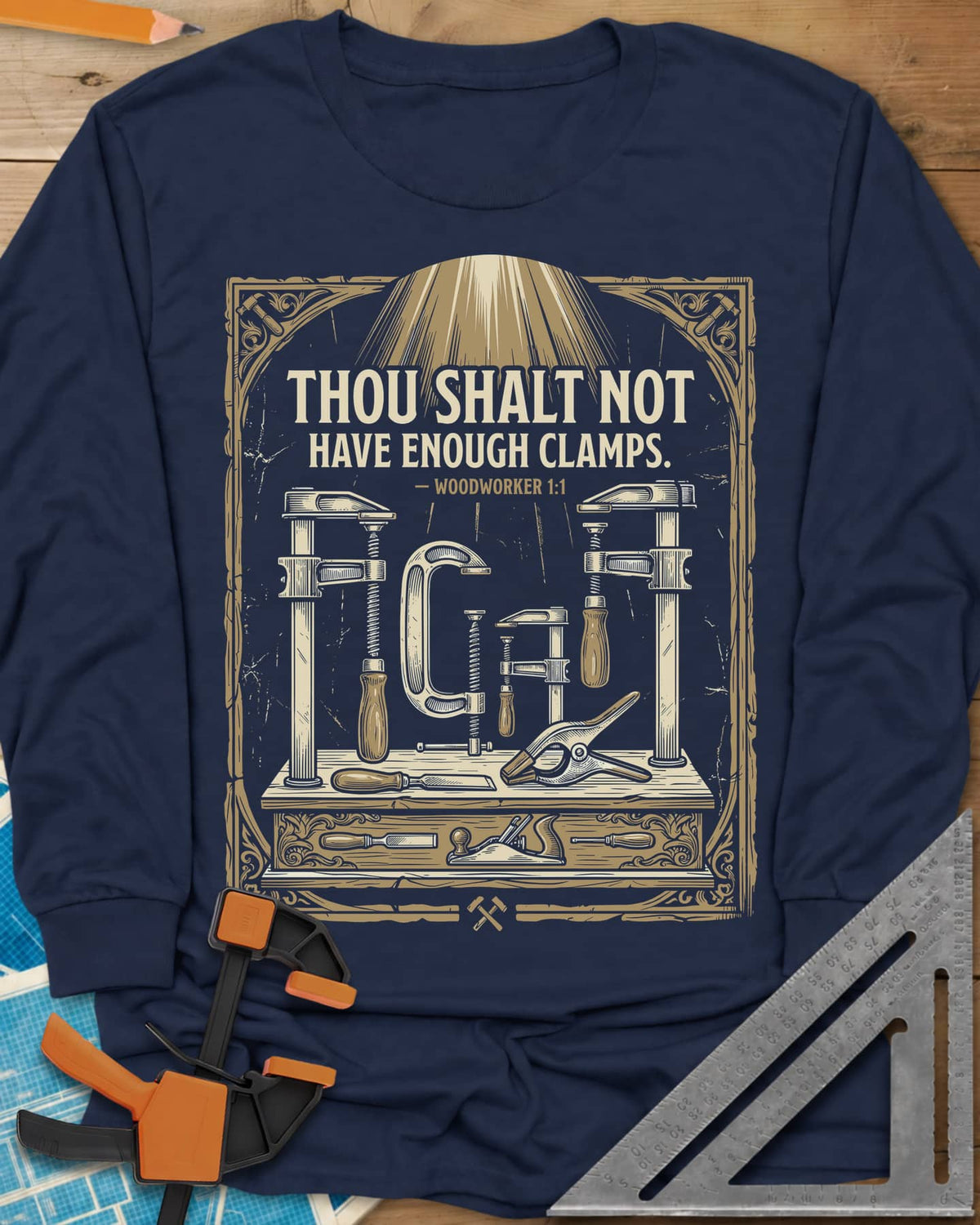 Thou Shalt Have Clamps long sleeve shirt in Navy, framed verse over a bench of clamps, a chisel and a hand plane