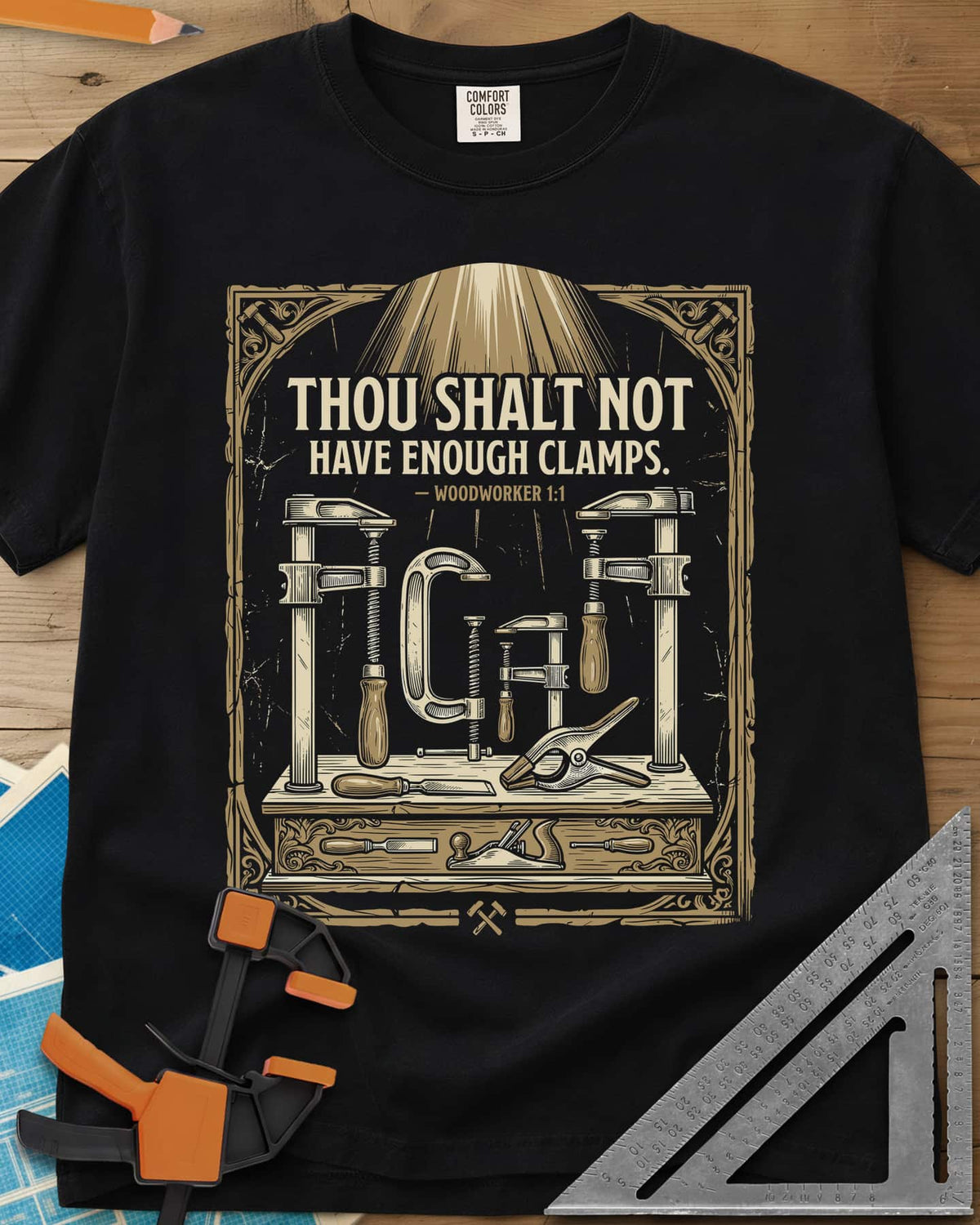 Thou Shalt Have Clamps heavyweight tee in Black, framed verse over a bench of clamps, a chisel and a hand plane