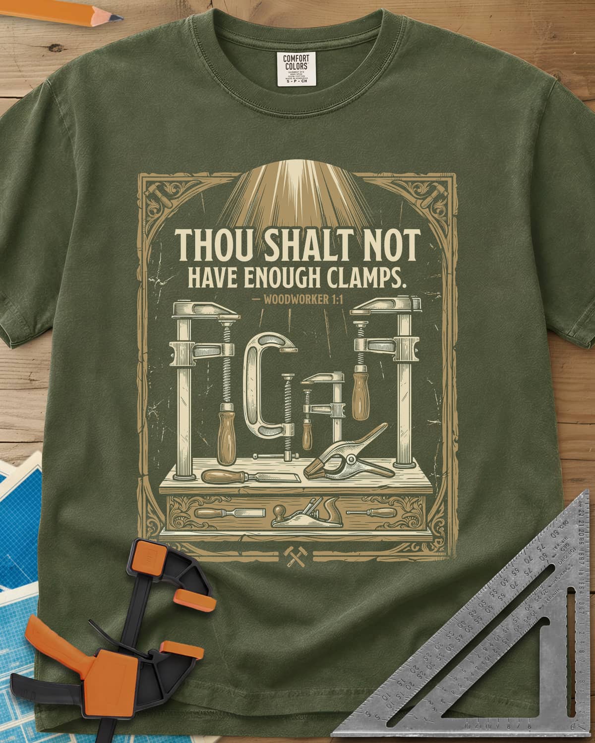 Thou Shalt Have Clamps heavyweight tee in Hemp, framed verse over a bench of clamps, a chisel and a hand plane