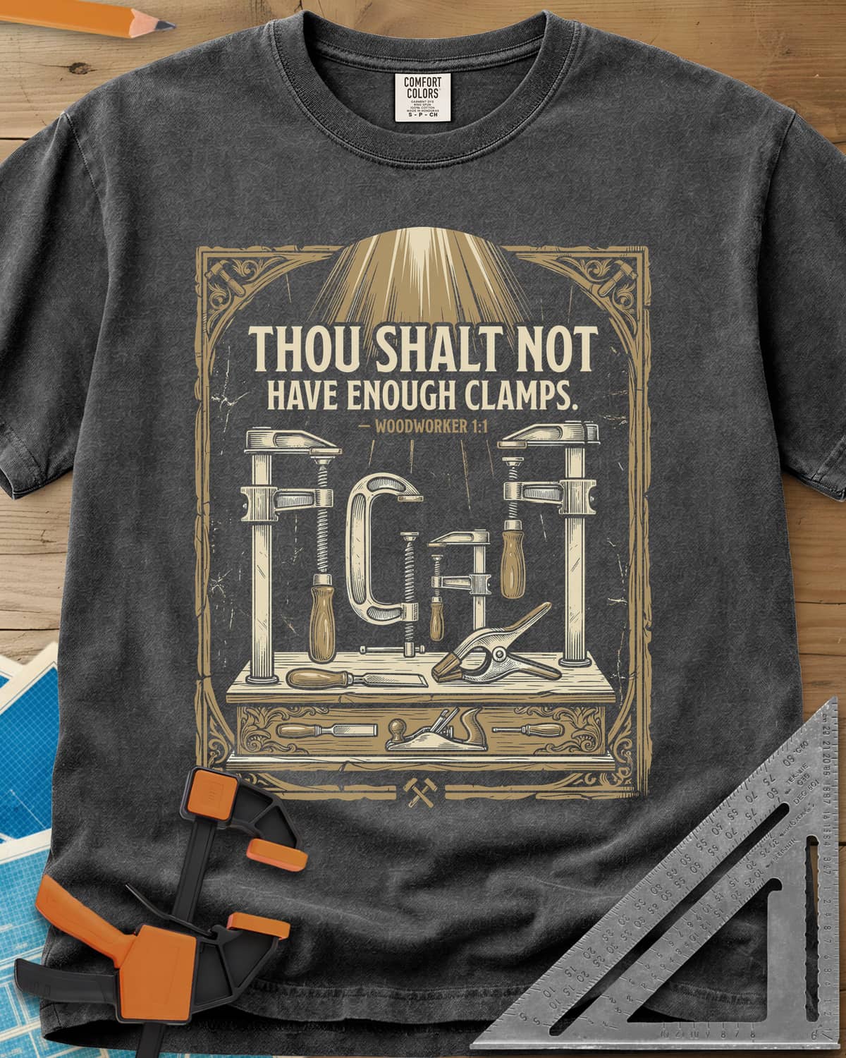 Thou Shalt Have Clamps heavyweight tee in Pepper, framed verse over a bench of clamps, a chisel and a hand plane