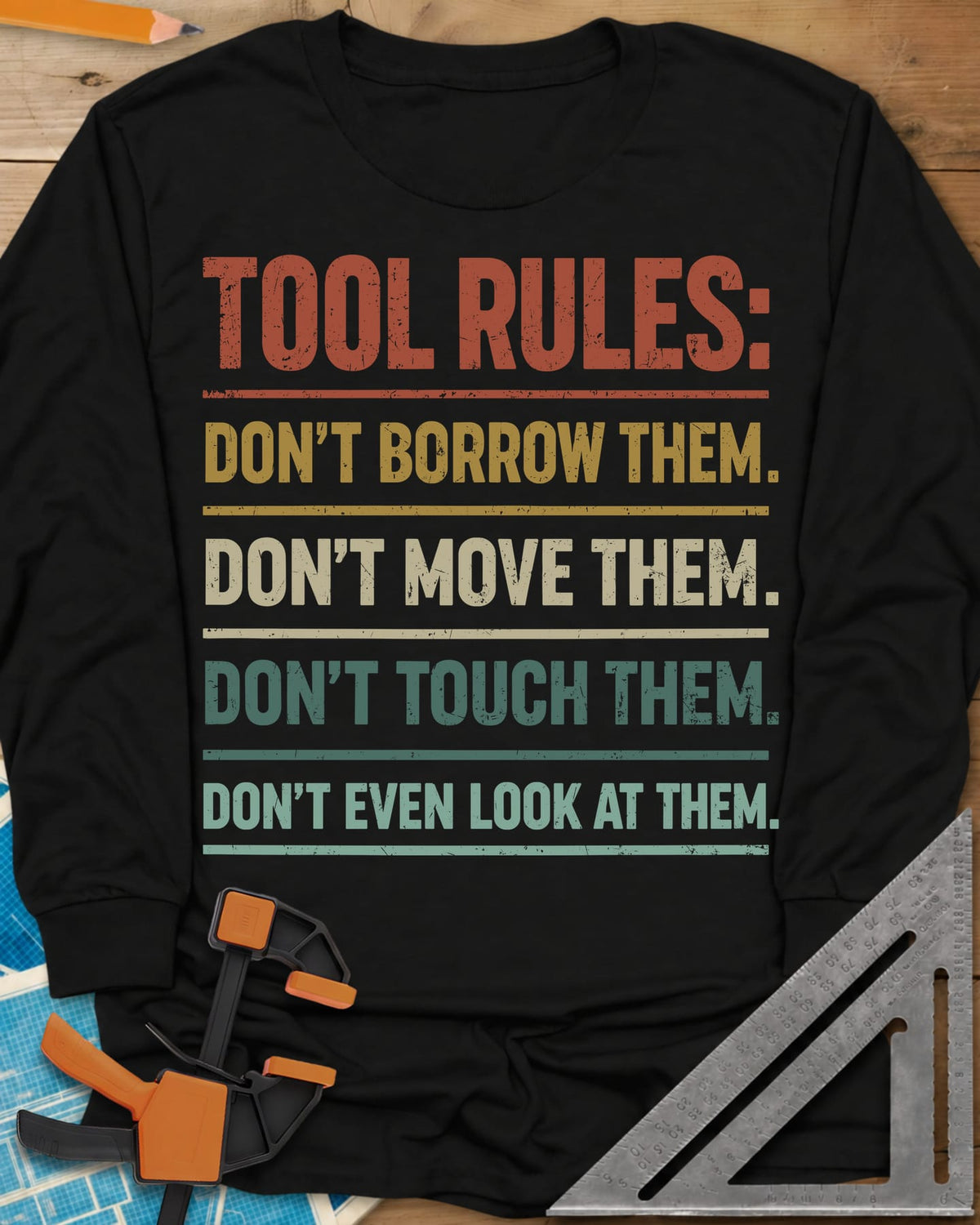 Tool Rules long sleeve shirt in Black, stacked rule lines in rust, mustard, cream and teal with thin dividers