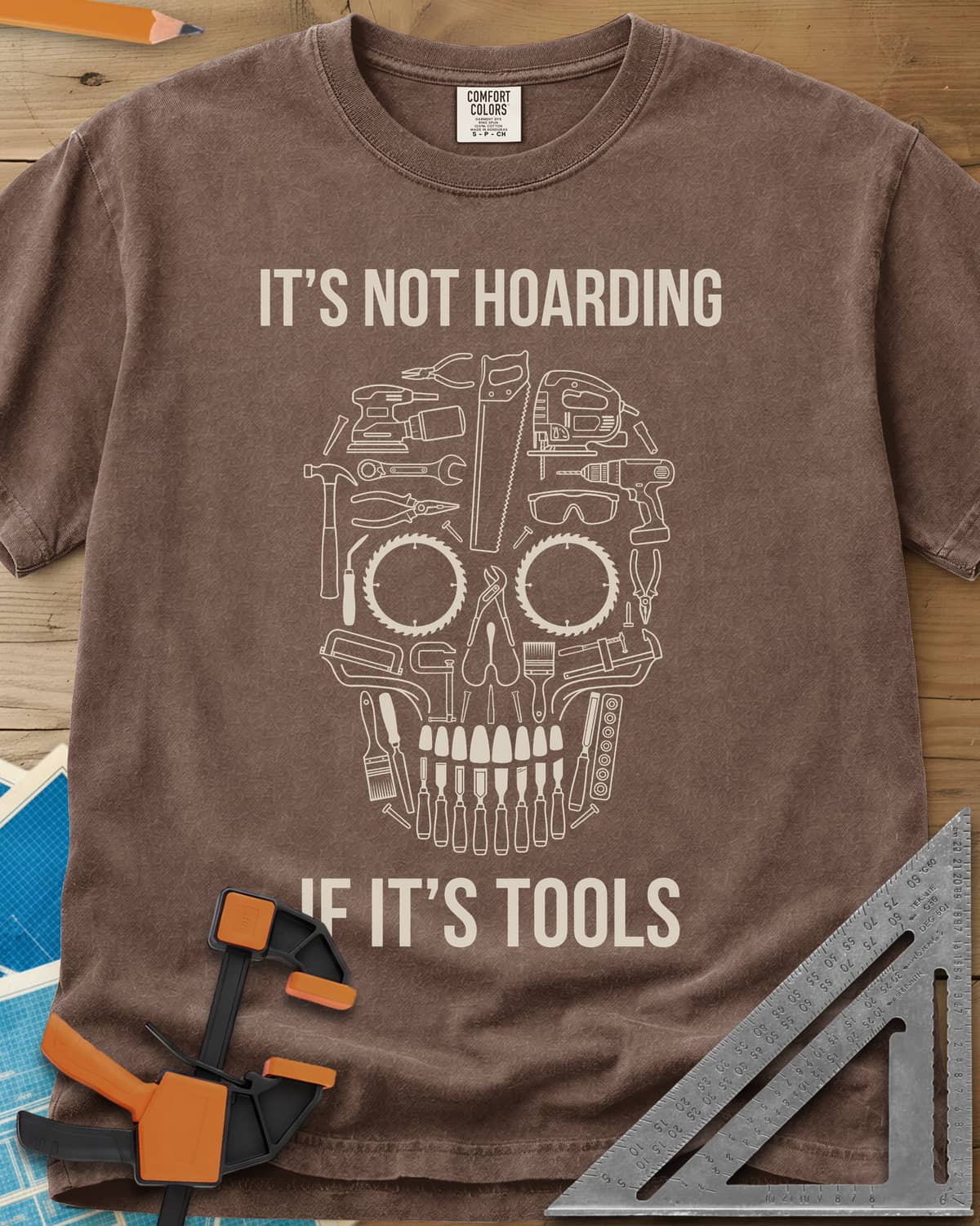 Tools Skull heavyweight tee in Espresso, a skull built from outlined tools, saw blades for eyes