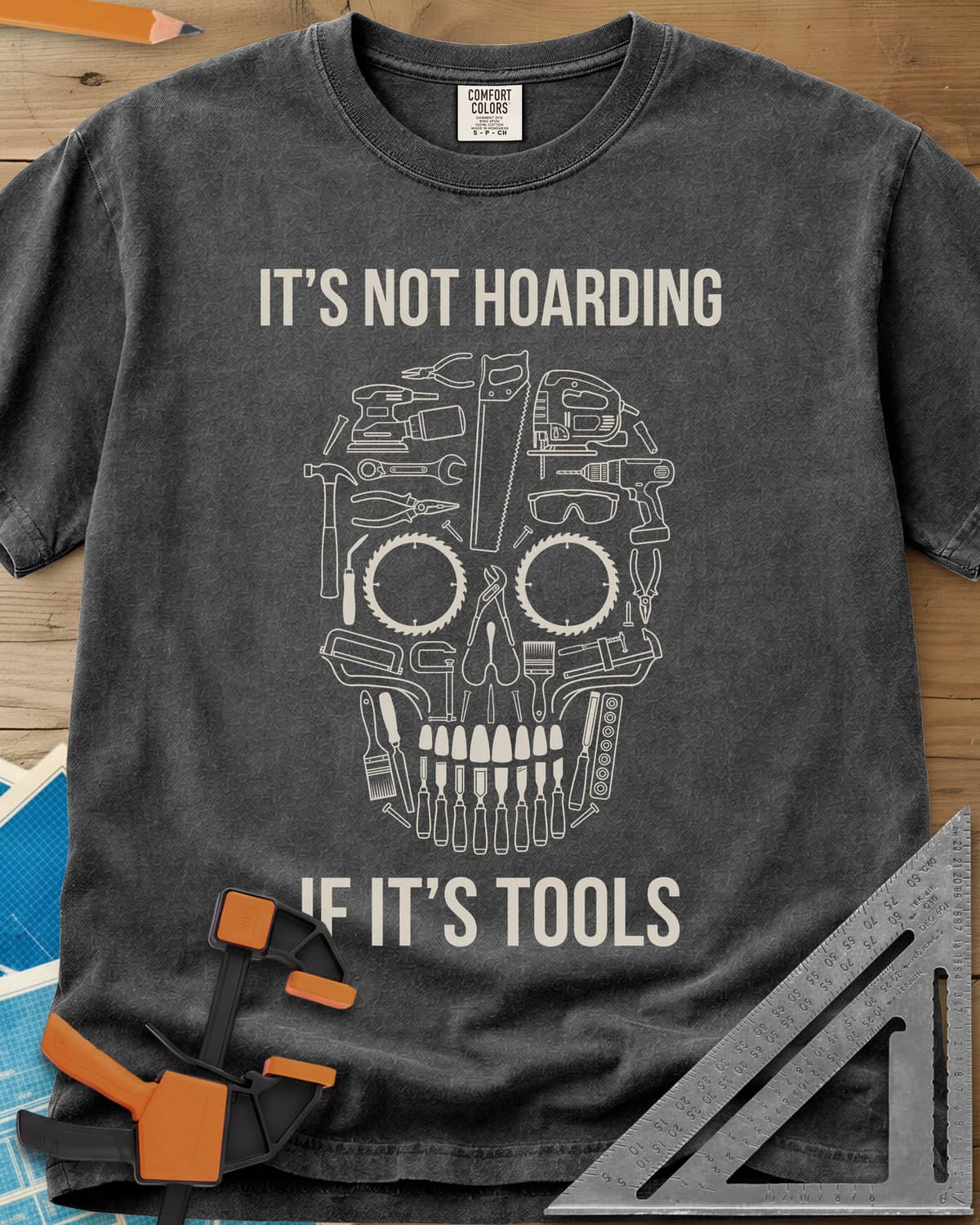 Tools Skull heavyweight tee in Pepper, a skull built from outlined tools, saw blades for eyes
