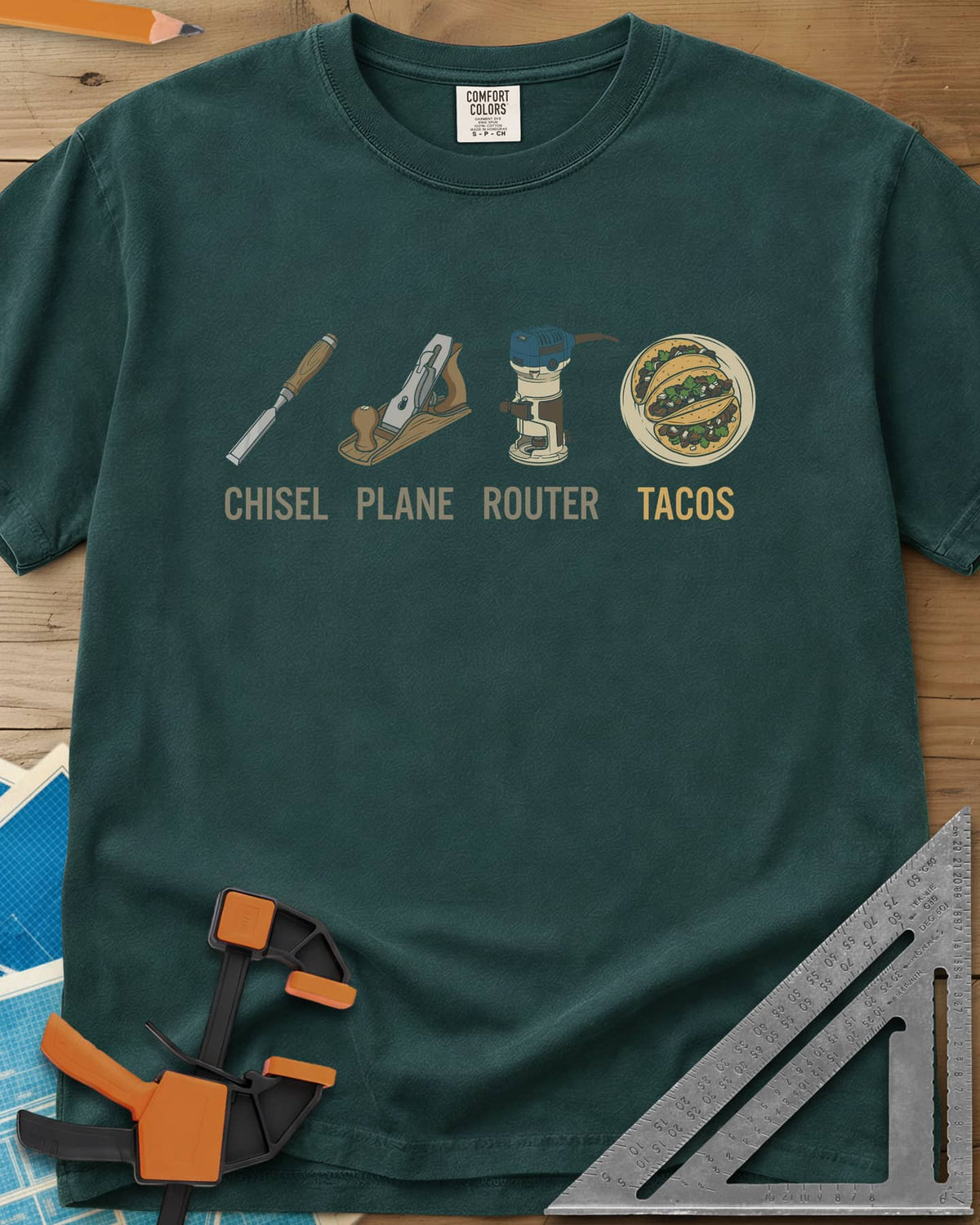 Tools & Tacos heavyweight tee in Blue Spruce, chisel, hand plane, router and a plate of tacos in a row