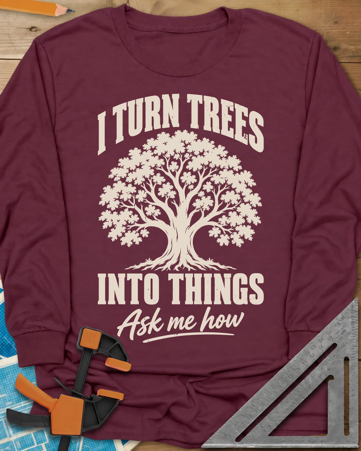 Tree Things long sleeve shirt in Maroon, a full-canopy tree between the lines of the slogan