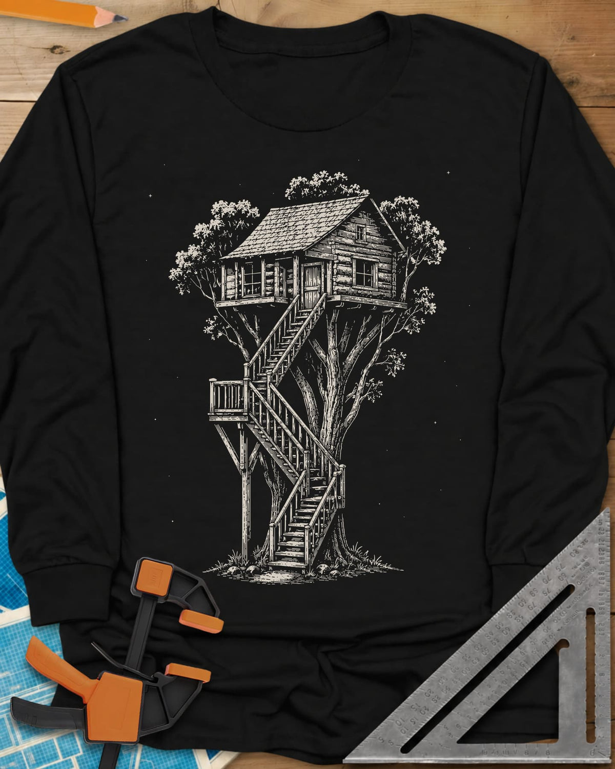 Treehouse Dream Build long sleeve shirt in Black, ink-style log cabin treehouse with a zigzag staircase
