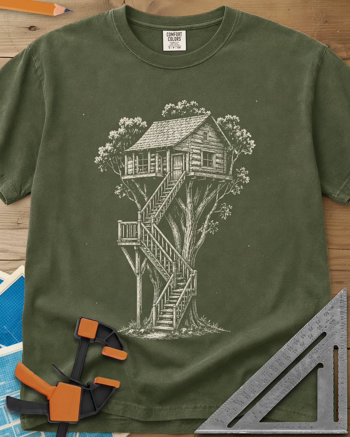 Treehouse Dream Build heavyweight tee in Hemp, ink-style log cabin treehouse with a zigzag staircase