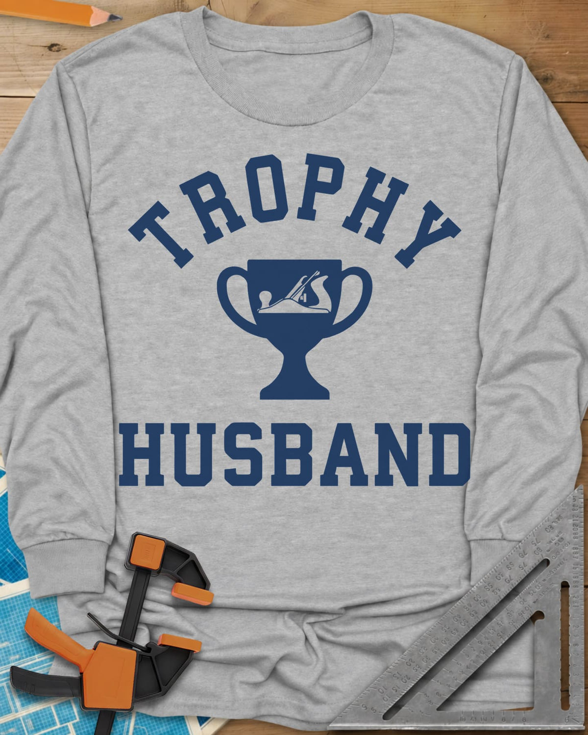 Trophy Husband Woodworker long sleeve shirt in Sport Grey, varsity lettering around a trophy cup with a hand plane on it