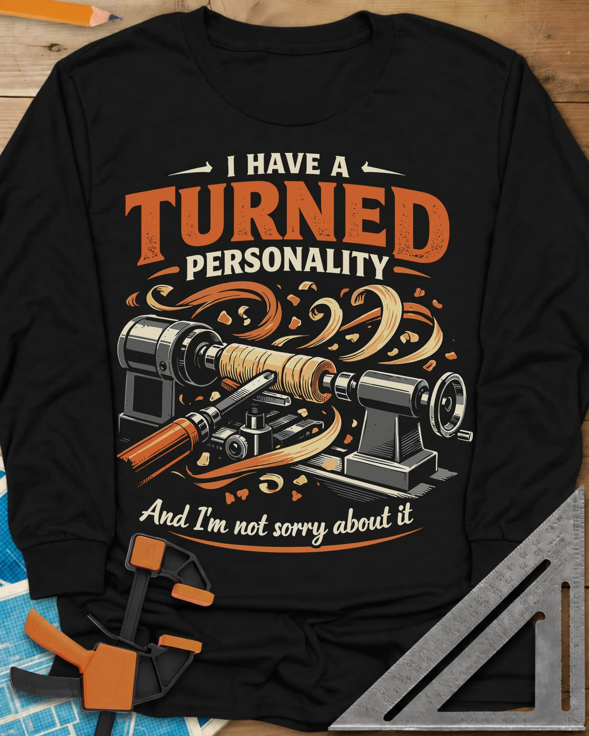 Turned Personality long sleeve shirt in Black, a wood lathe spinning a blank in a spray of orange shavings