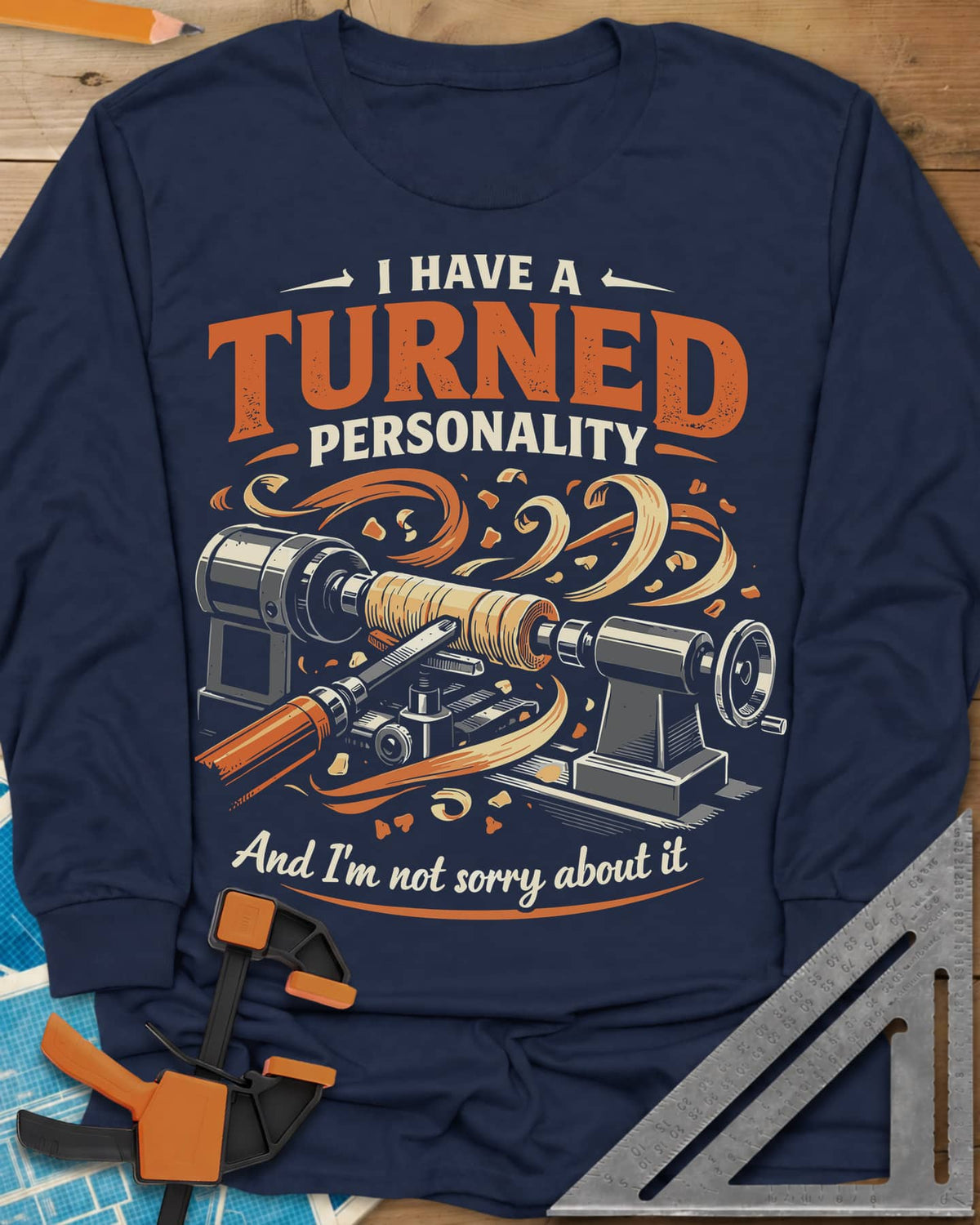 Turned Personality long sleeve shirt in Navy, a wood lathe spinning a blank in a spray of orange shavings