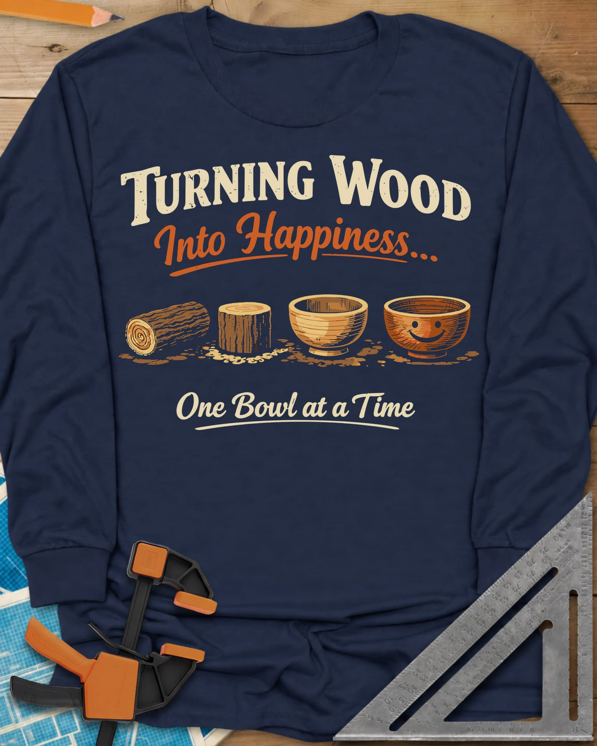 Turning Happiness long sleeve shirt in Navy, a log, a stump, a plain bowl and a bowl with a smiley face