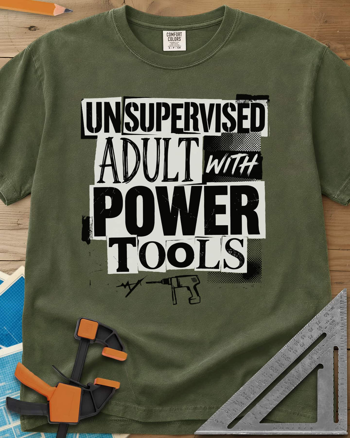 Unsupervised Adult Power Tools Humor heavyweight tee in Hemp, cut-paper ransom-note lettering with a small drill underneath