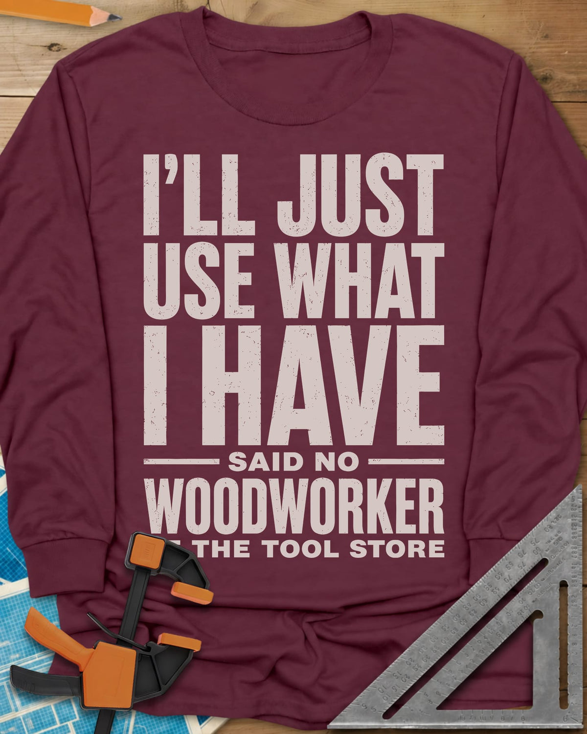 Use What I Have long sleeve shirt in Maroon, stacked bold lettering with a worn, distressed texture