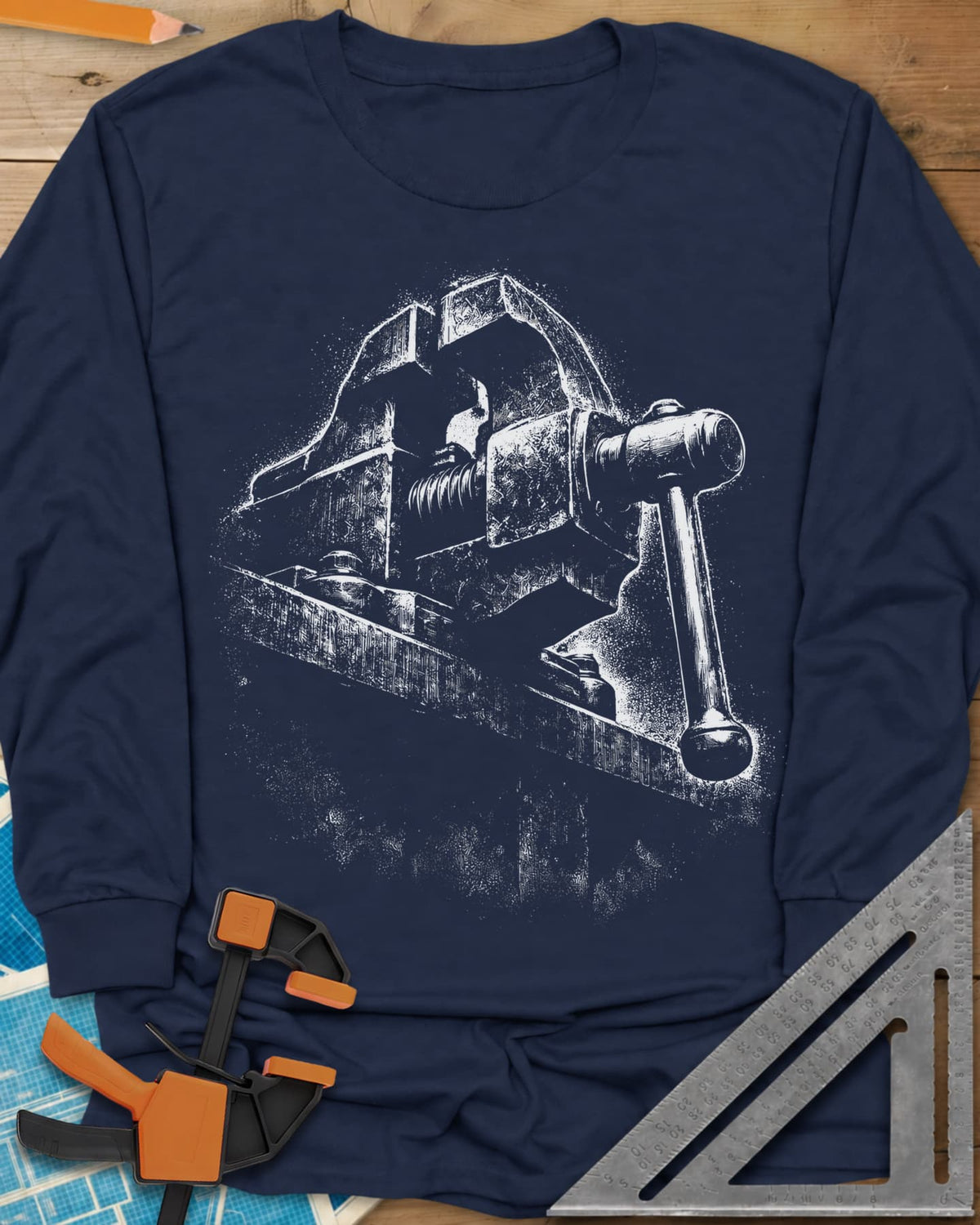 Vintage Bench Vise long sleeve shirt in Navy, a worn cast-iron bench vise in gritty chalk-dust texture