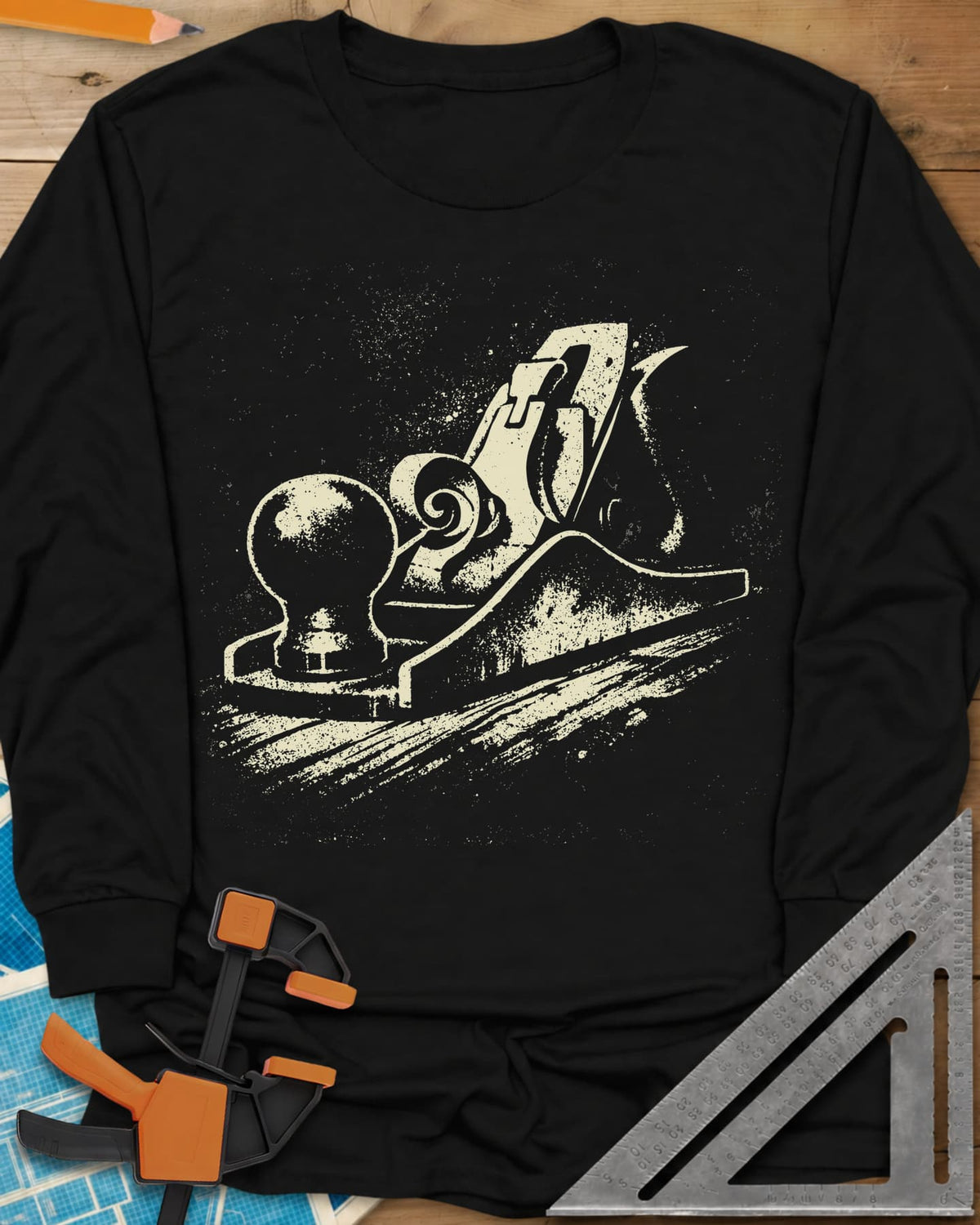 Vintage Hand Plane long sleeve shirt in Black, a speckled hand plane with a shaving curl on grained wood