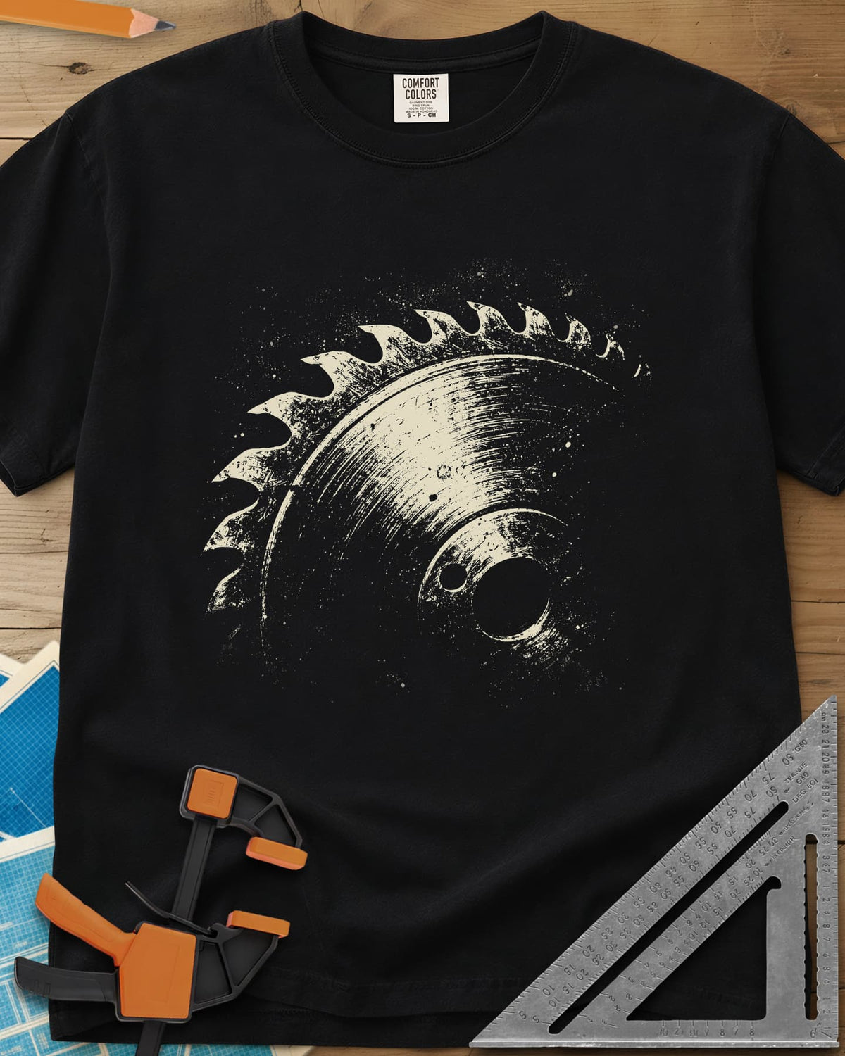 Vintage Saw Blade heavyweight tee in Black, a worn, speckled circular saw blade