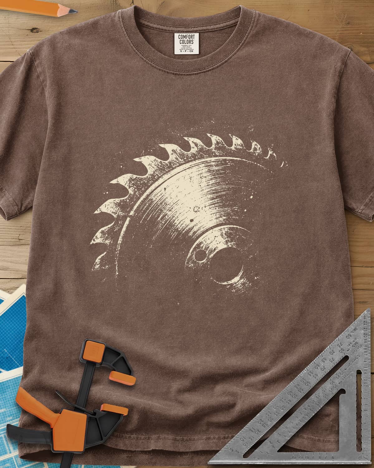 Vintage Saw Blade heavyweight tee in Espresso, a worn, speckled circular saw blade