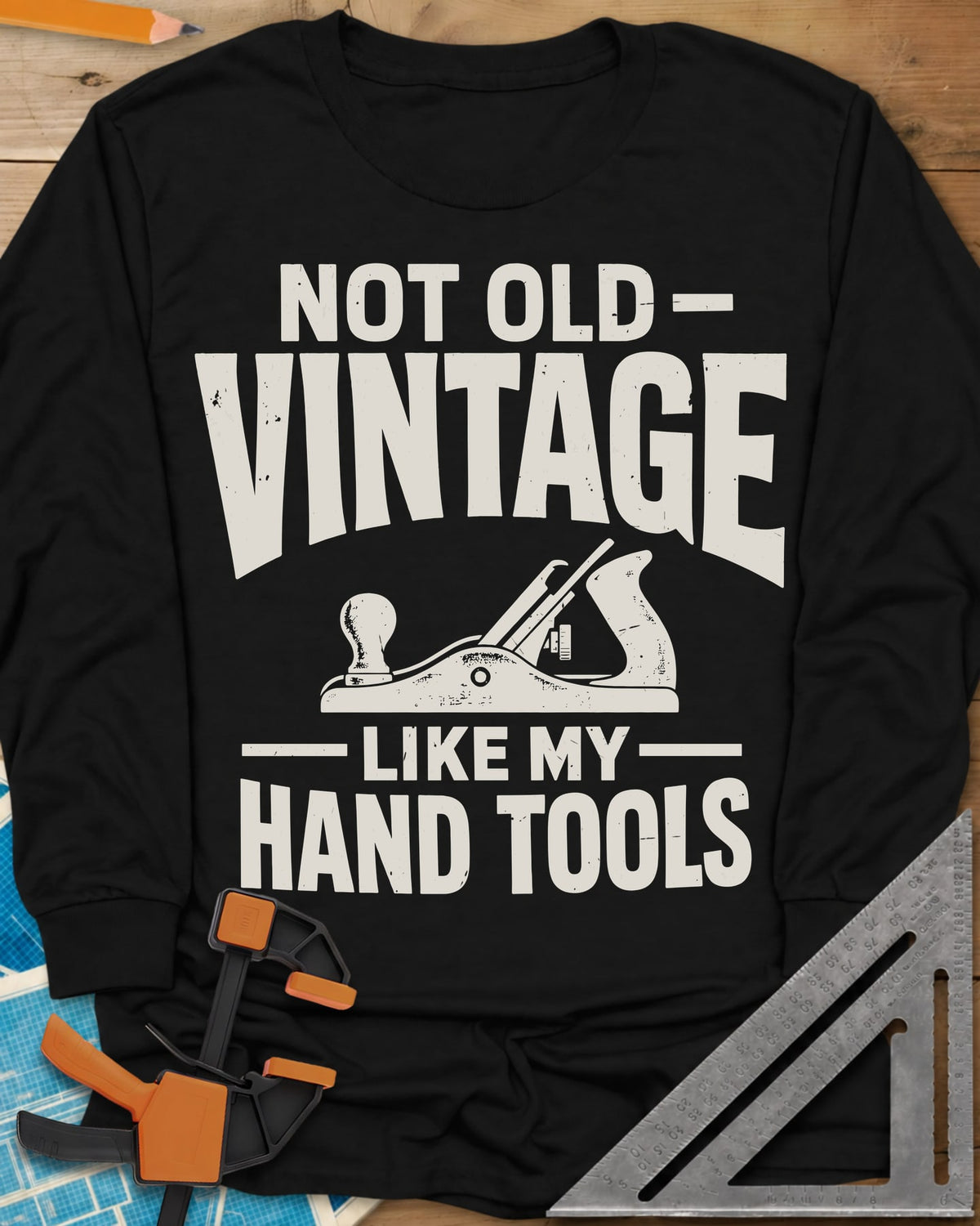 Vintage Tools long sleeve shirt in Black, a small bench plane between worn block lettering