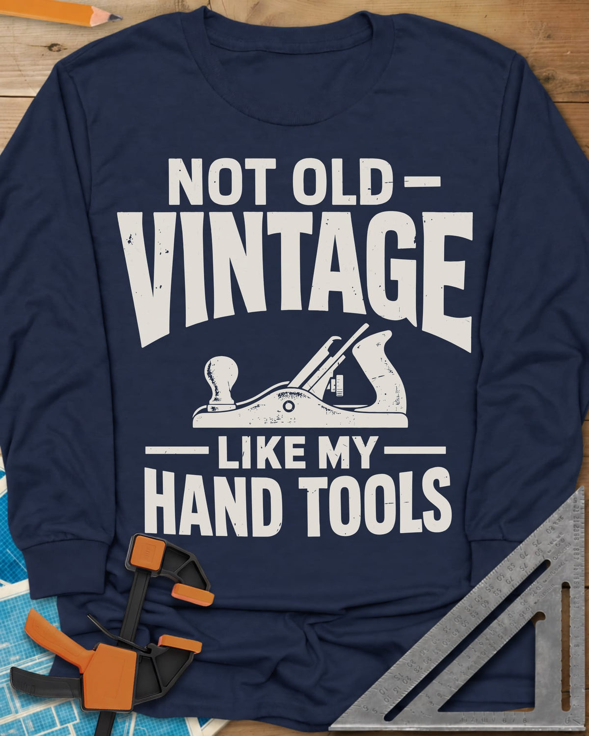 Vintage Tools long sleeve shirt in Navy, a small bench plane between worn block lettering